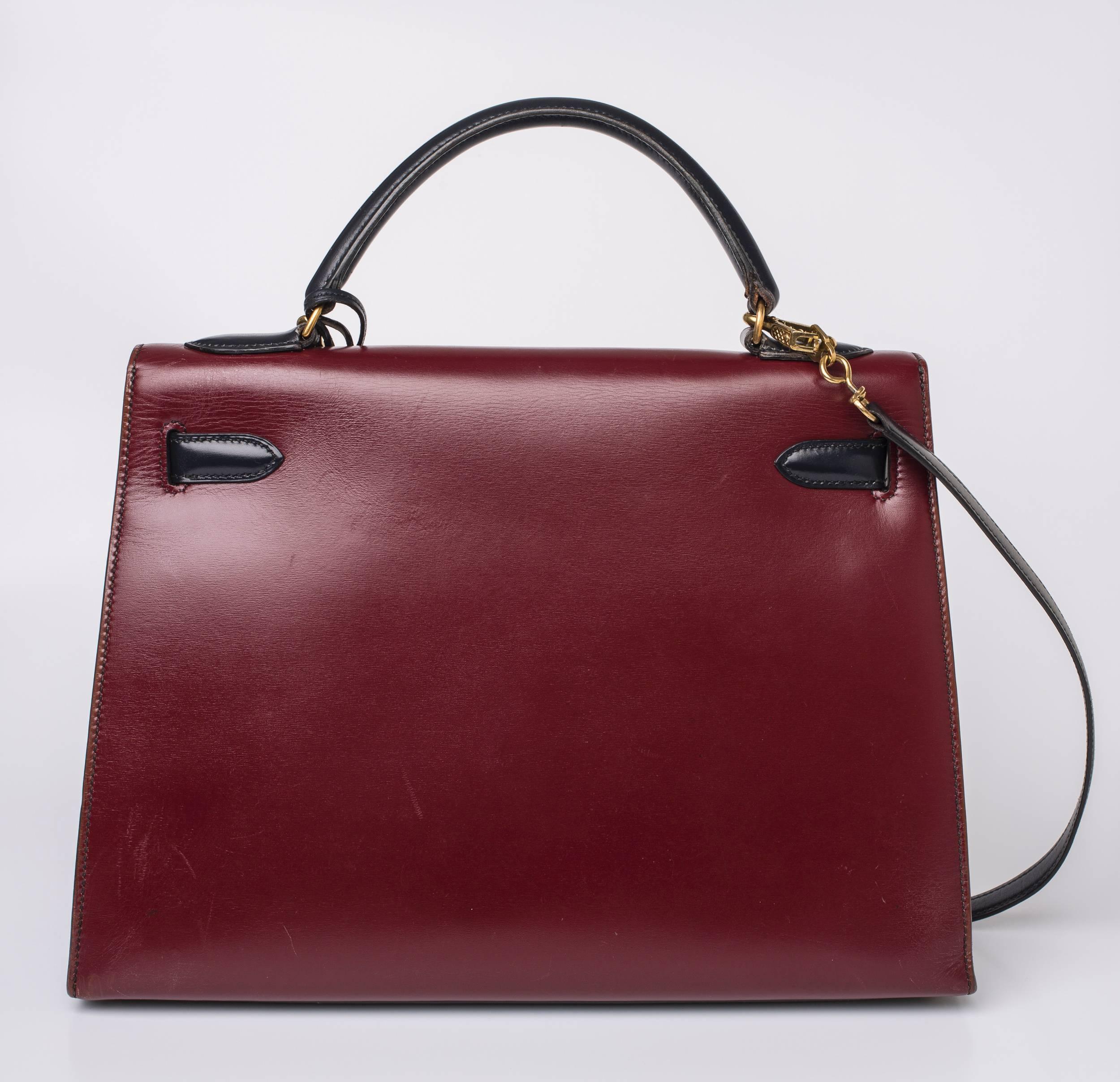 Hermès Paris green and wine-colored color-block Kelly bag in calf skin. Date stamped circle 