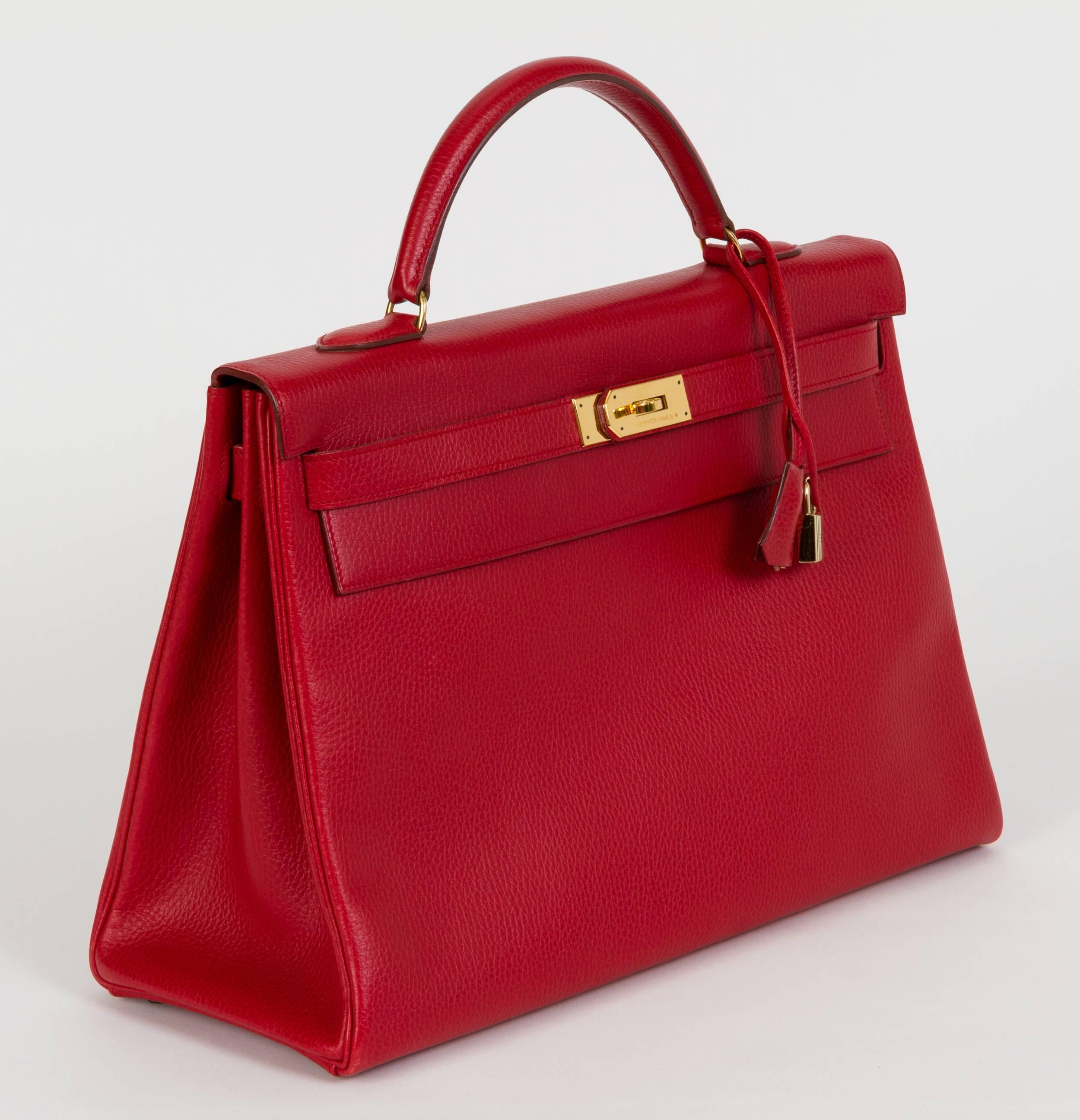 Hermès 40cm Kelly bag in red Ardenne leather and goldtone hardware. Handle drop, 4.