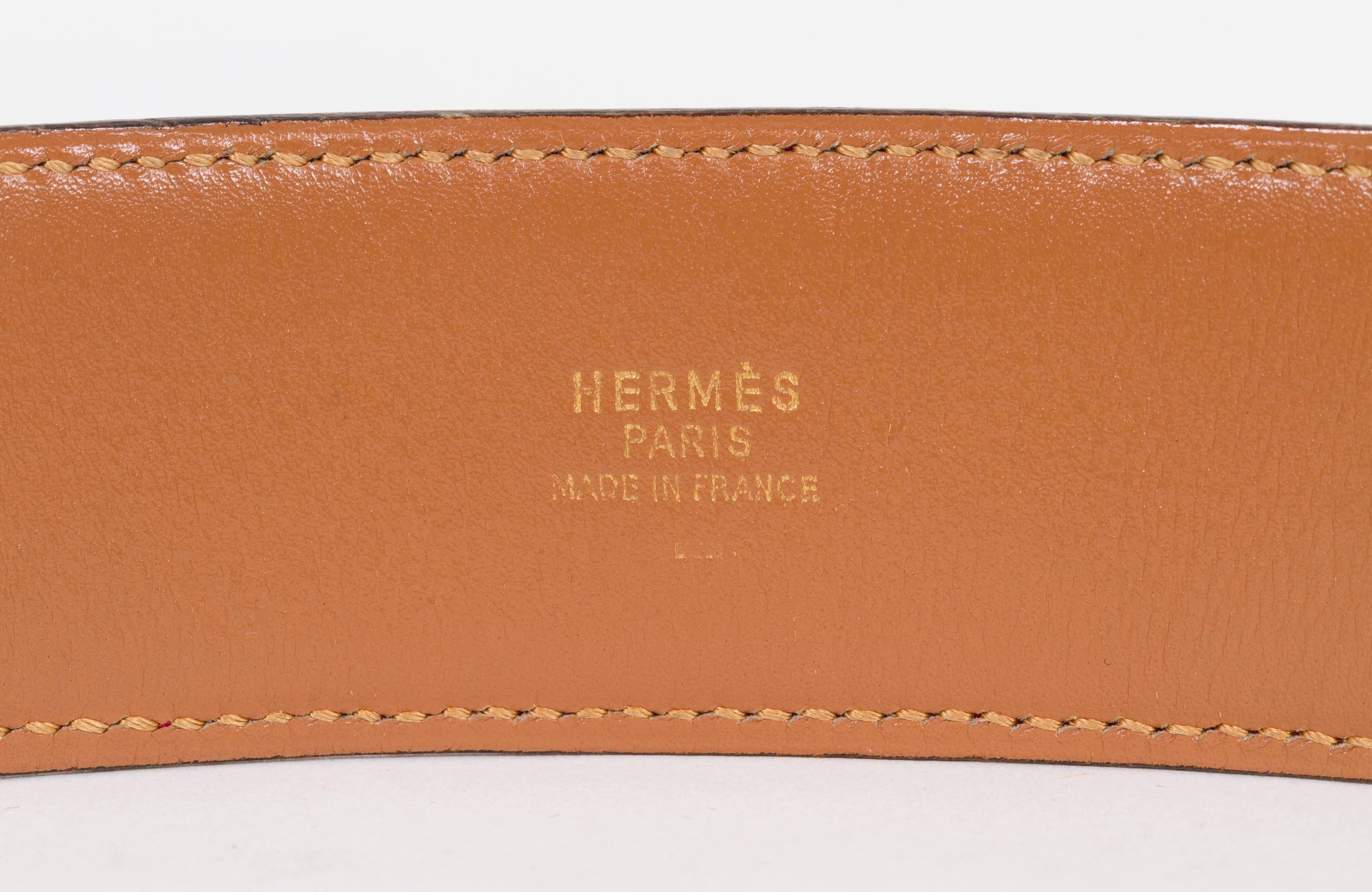 Hermès collier de Chien red lizard belt with gold rhodium metal. Size 75 cm. Dated Y in a circle for 1995. Comes in original dust bag.