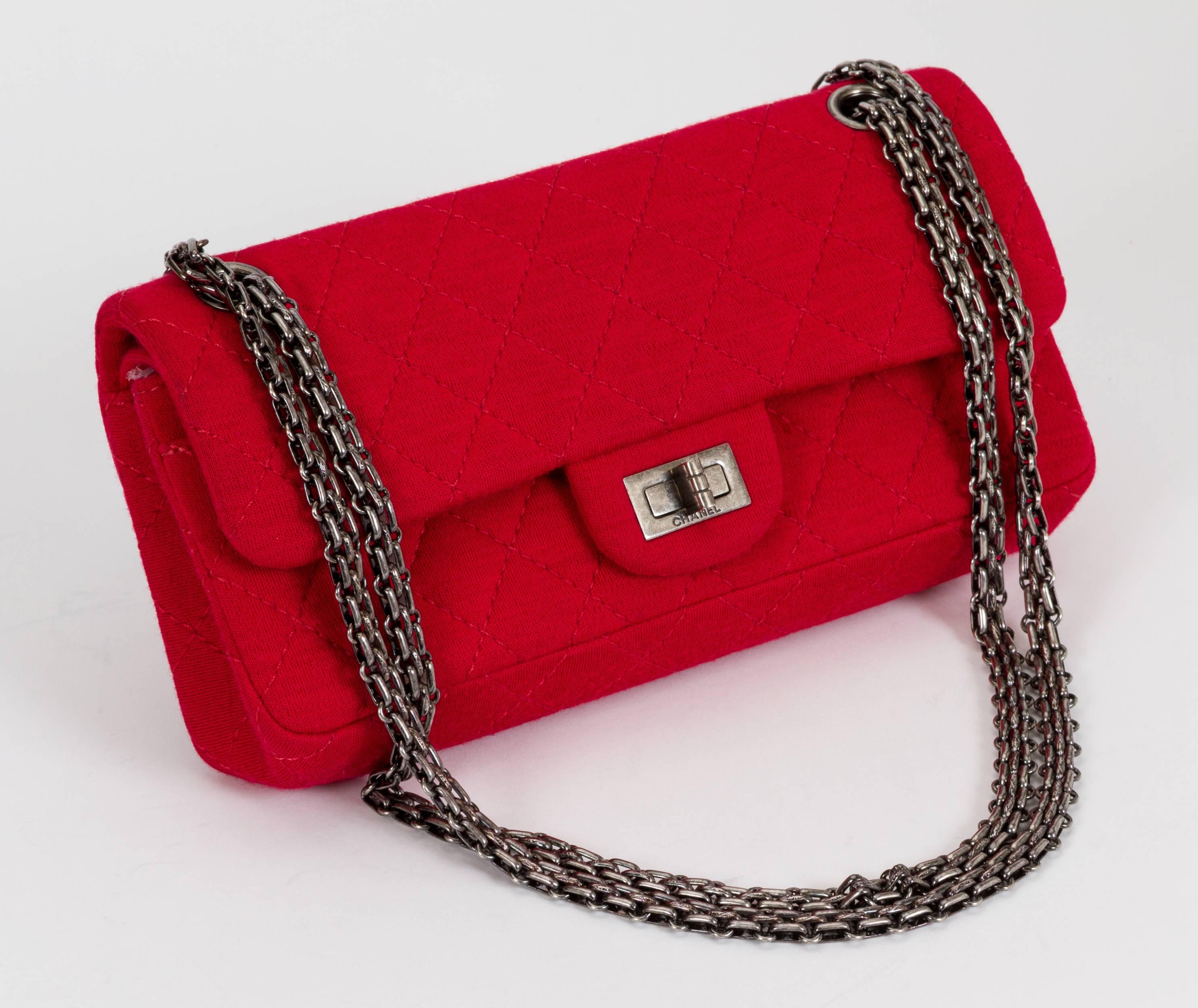 Chanel red jersey quilted double flap with ruthenium mademoiselle chain hardware. Shoulder drop, 11.5