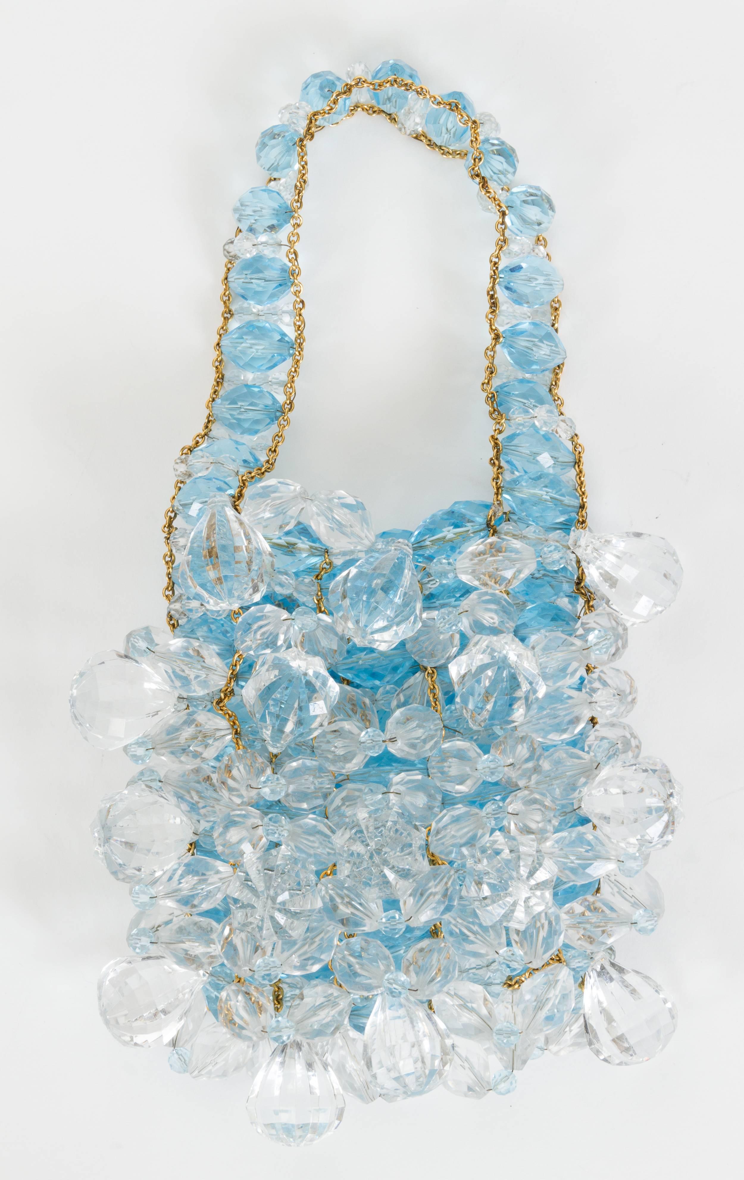 Chanel evening bag adorned with clear and celeste Lucite beads. Goldtone chain. Shoulder drop, 5.5