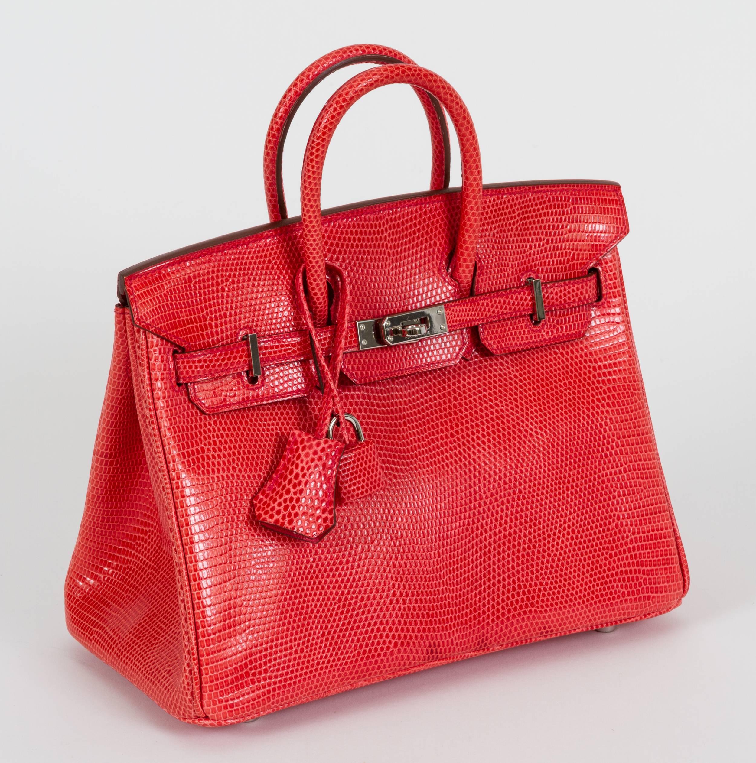 Hermès 25cm Birkin bag in rouge lizard leather and palladium hardware. Handle drop, 3