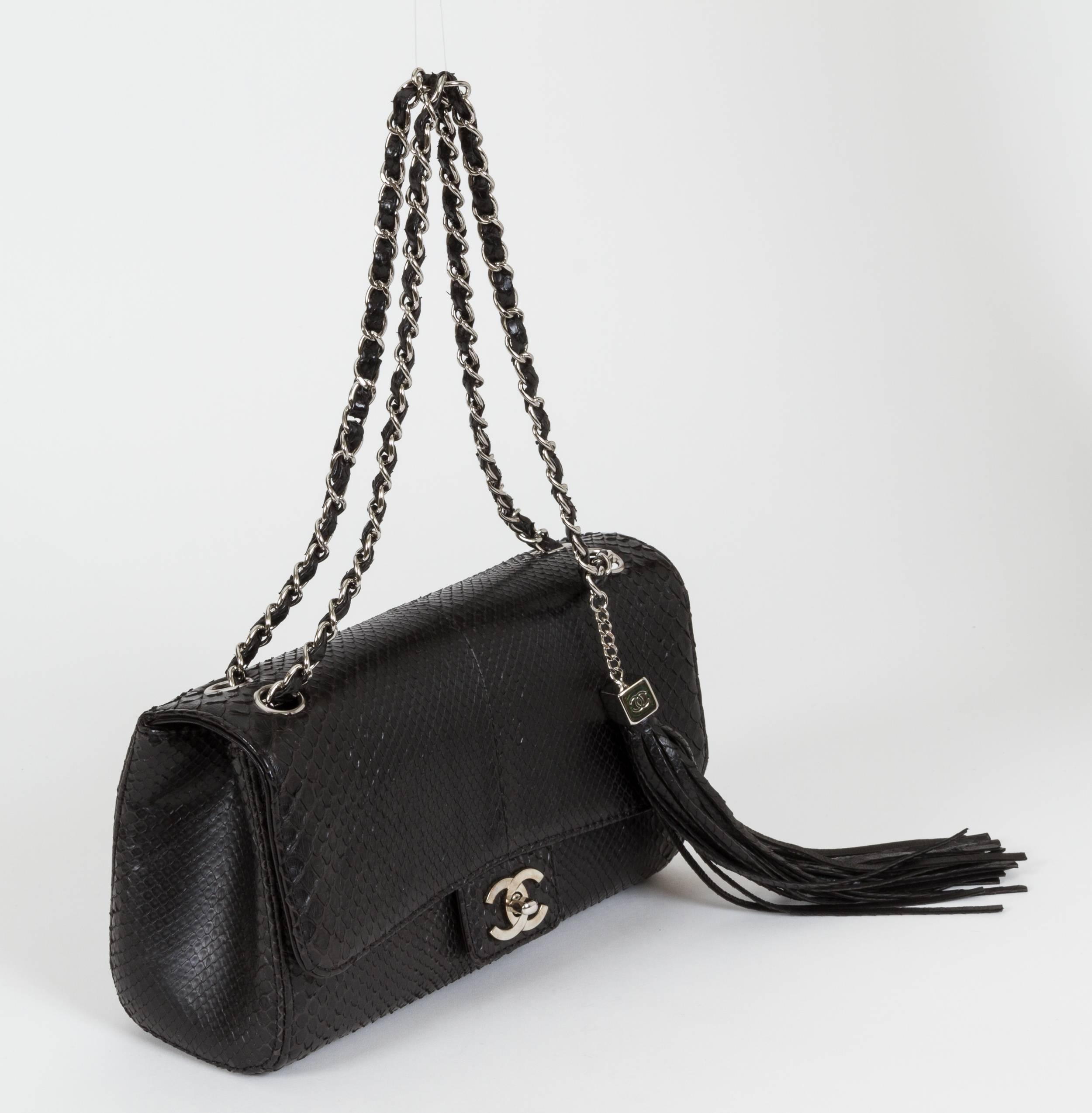 Chanel rare black python tassel single flap with dangling tassel. Shoulder drop 9