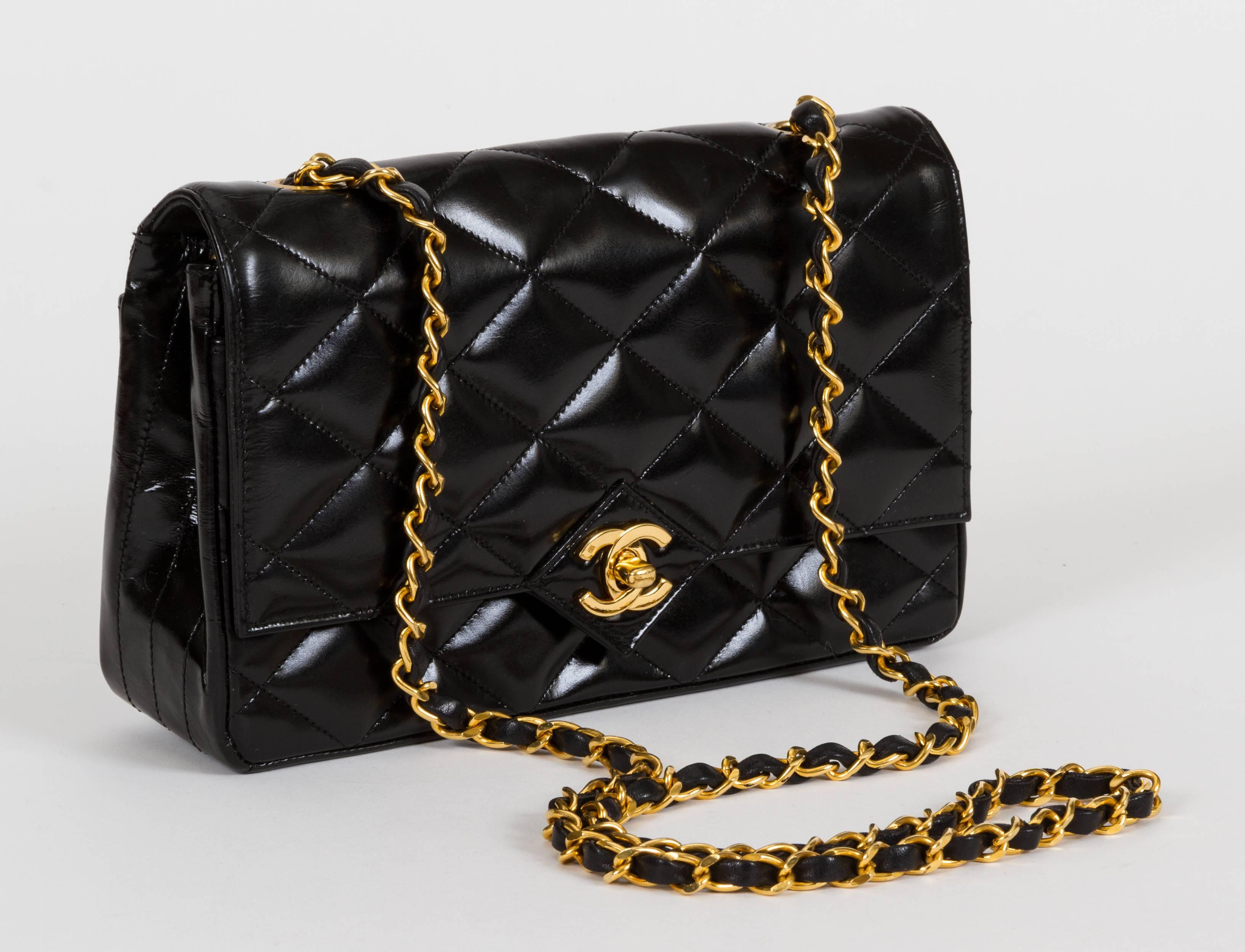 1990s Chanel black patent leather single envelope flap bag. Shoulder drop, 21