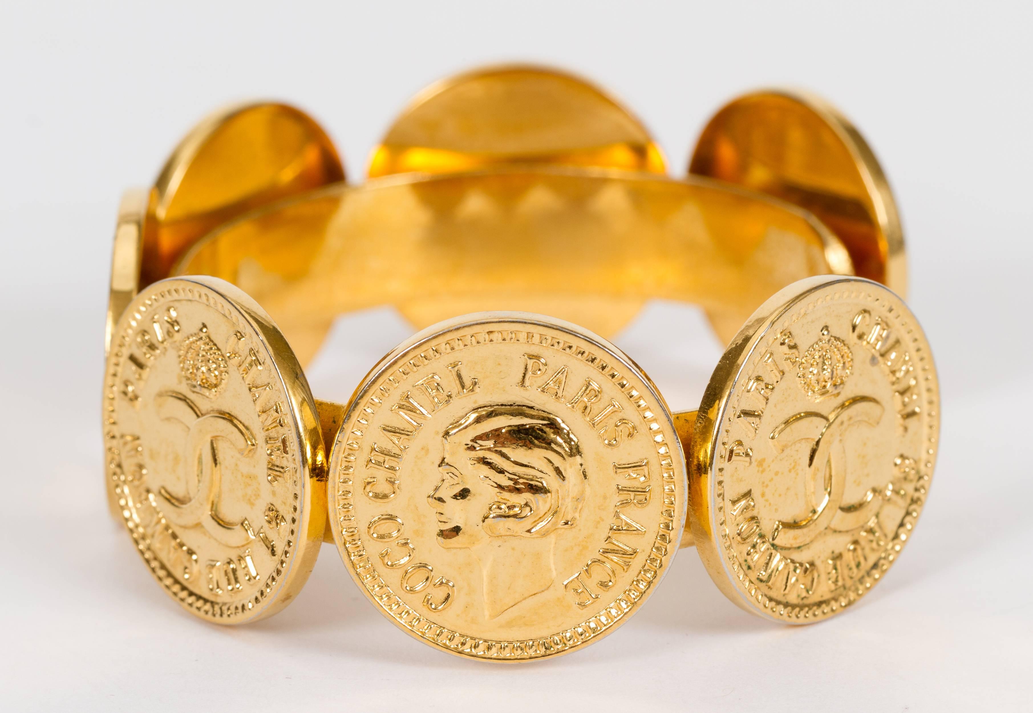 1980s Chanel Gold Coin Logo Cuff Bracelet In Good Condition In West Hollywood, CA
