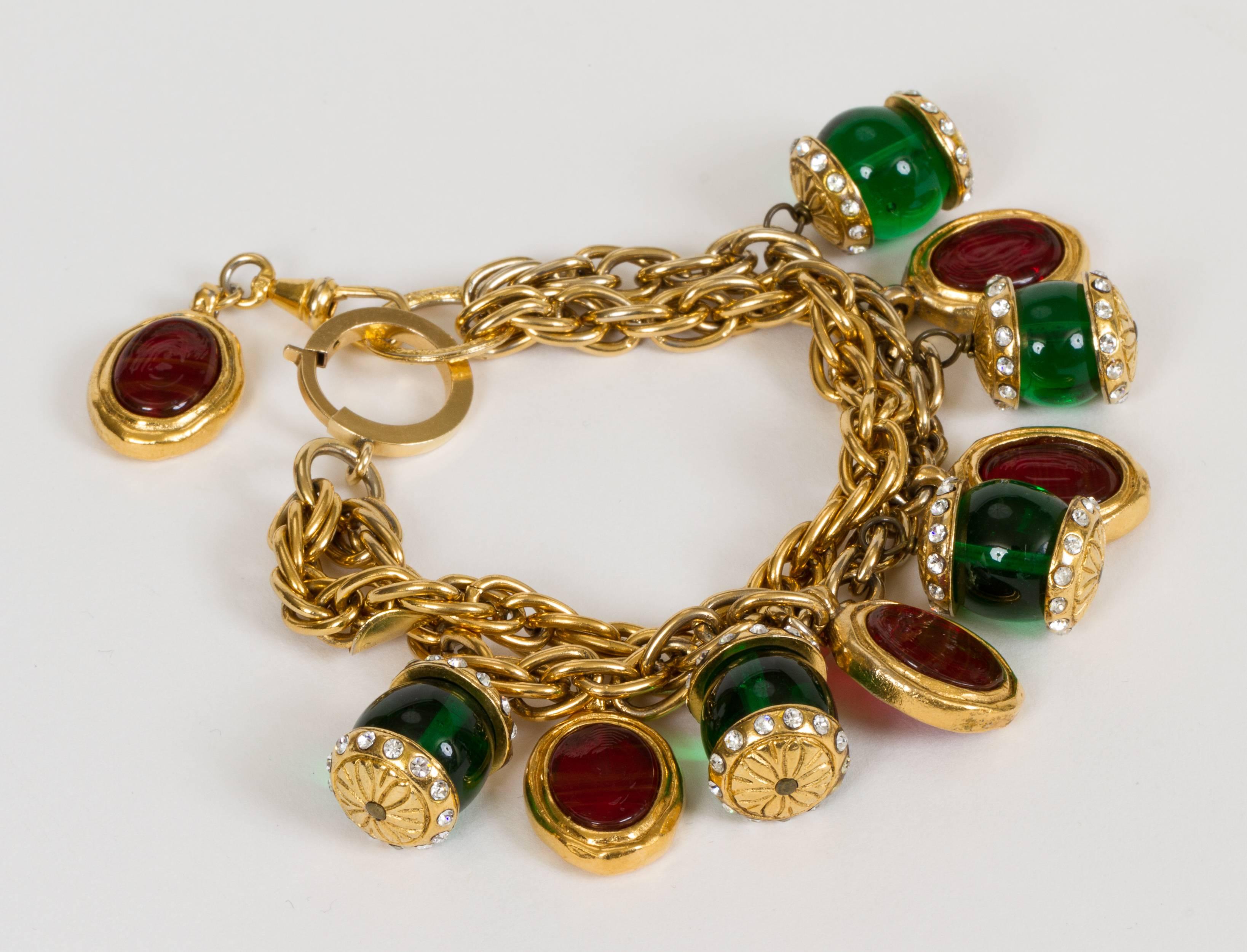 1970s Chanel double-strand bracelet with gripoix and crystal charms. Comes with velvet pouch.
