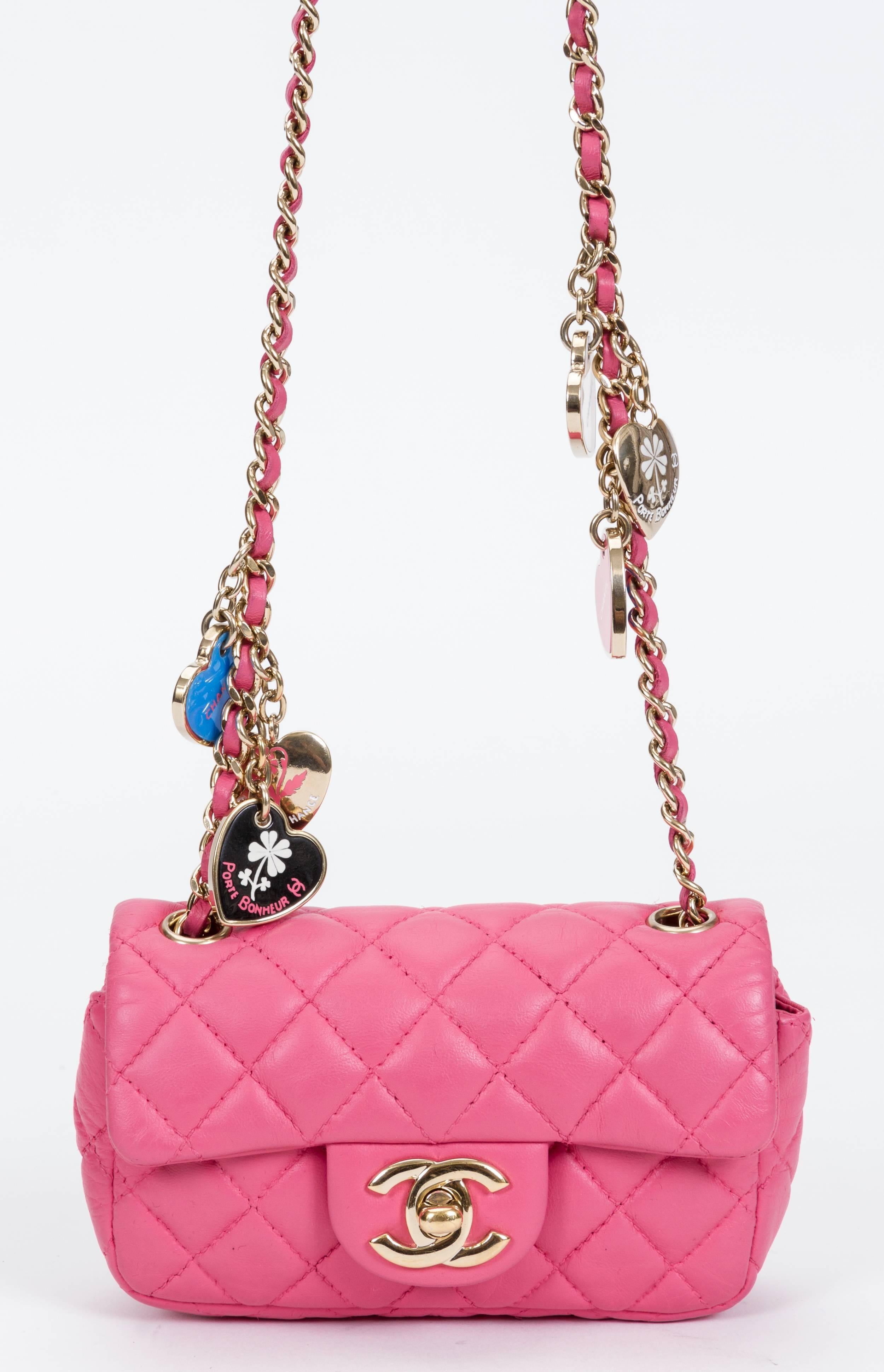 Chanel collectible Valentine s cross body pink lambskin bag. Dangling heart charms. Shoulder drop 23