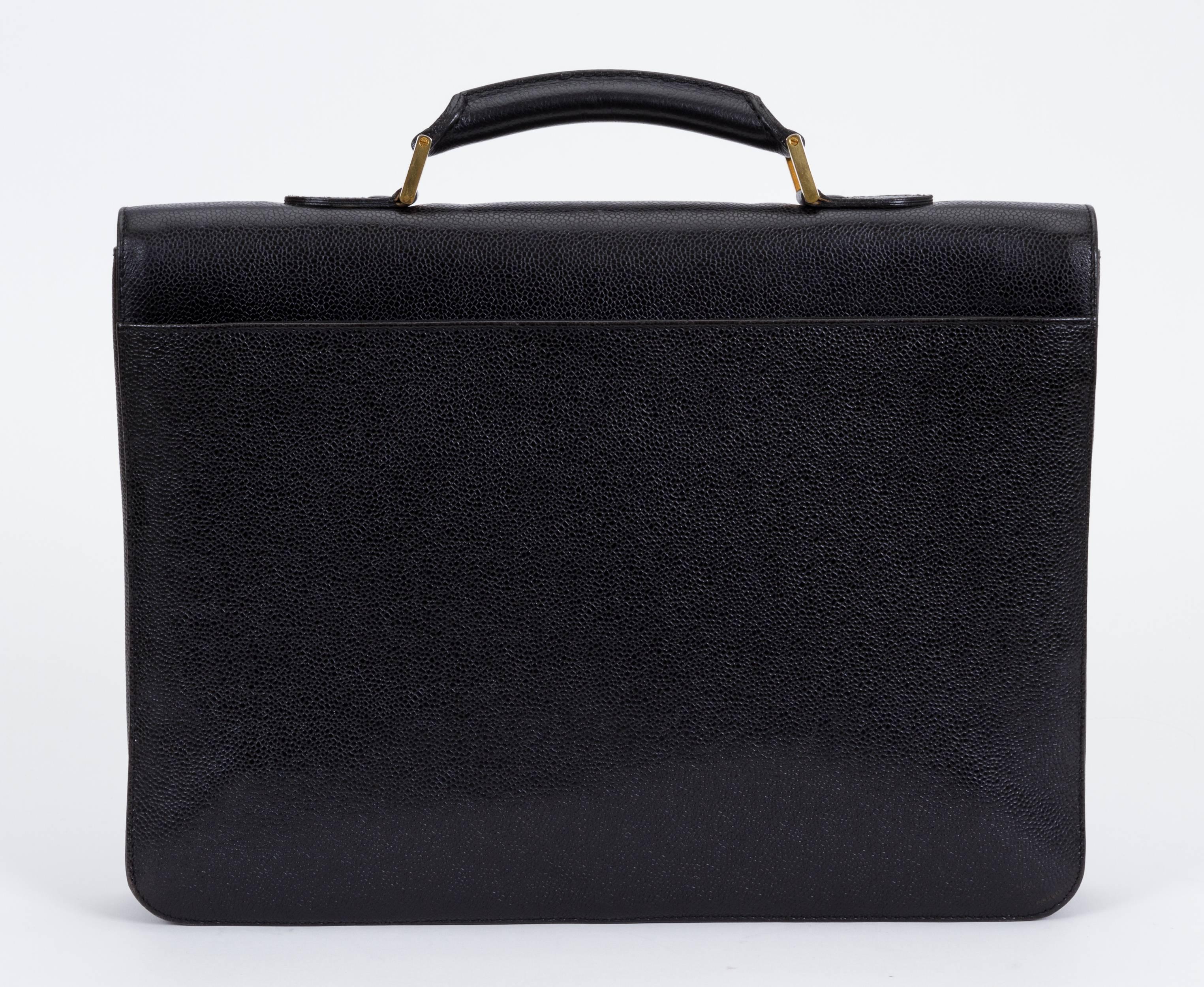 Chanel mint condition rare caviar leather black briefcase. Clochette, tirette and key inside. Handle drop, 2