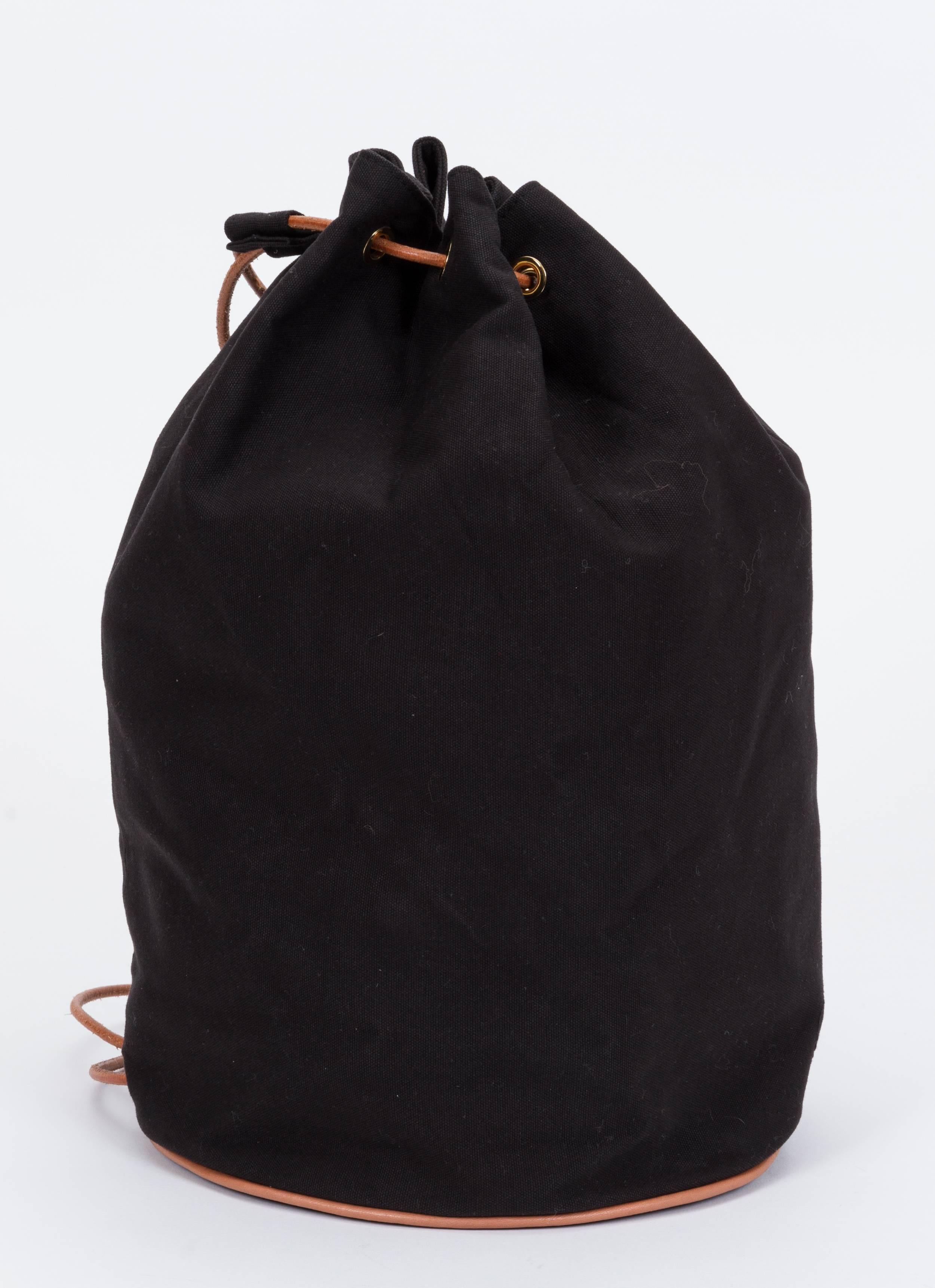 Hermes black toile backpack with cuir leather details . Shoulder drop 11