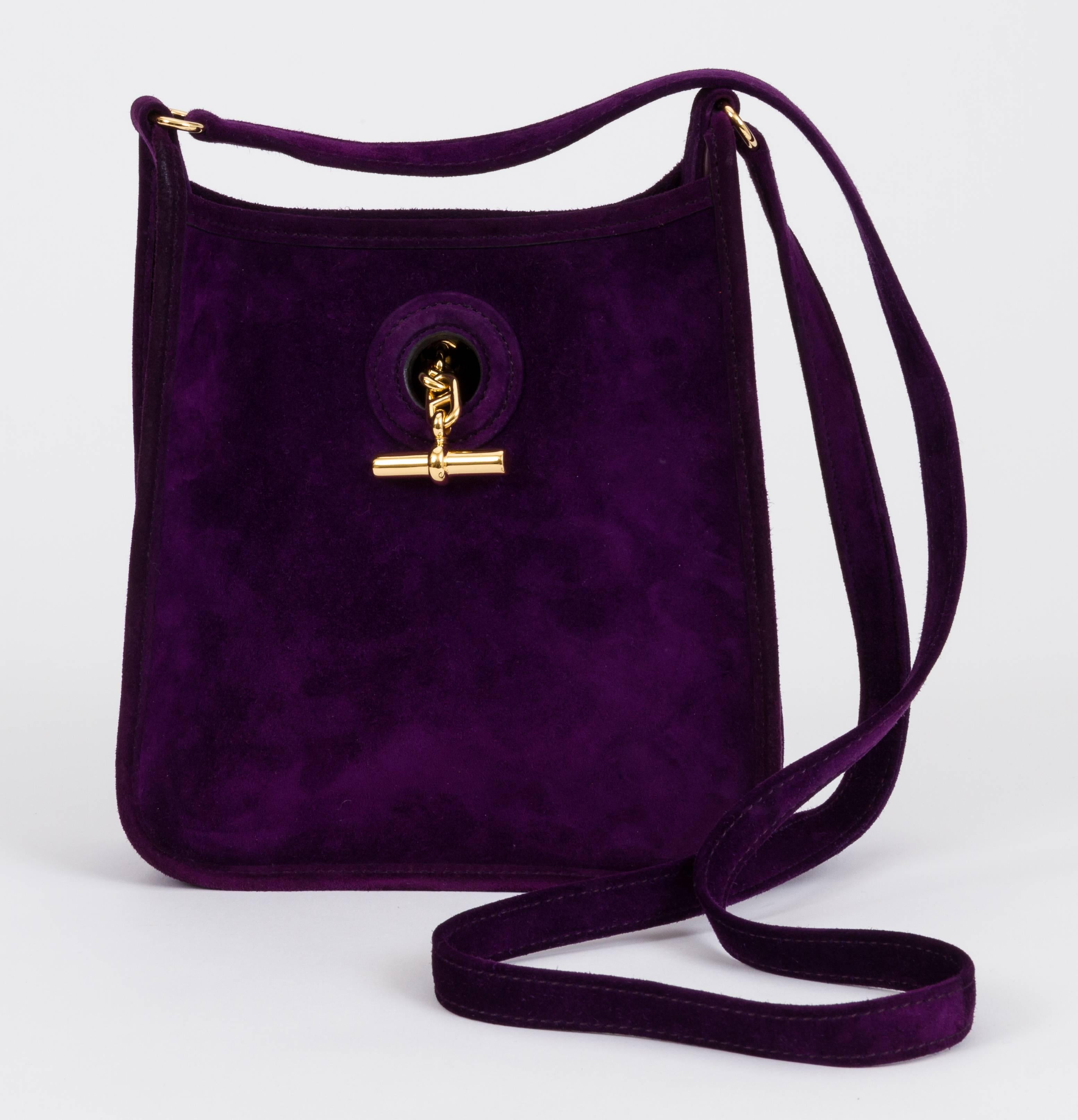 Hermes rare and collectible mini vespa TPM cross body bag. Doblis (suede) purple leather and gold tone hardware. Shoulder drop 23