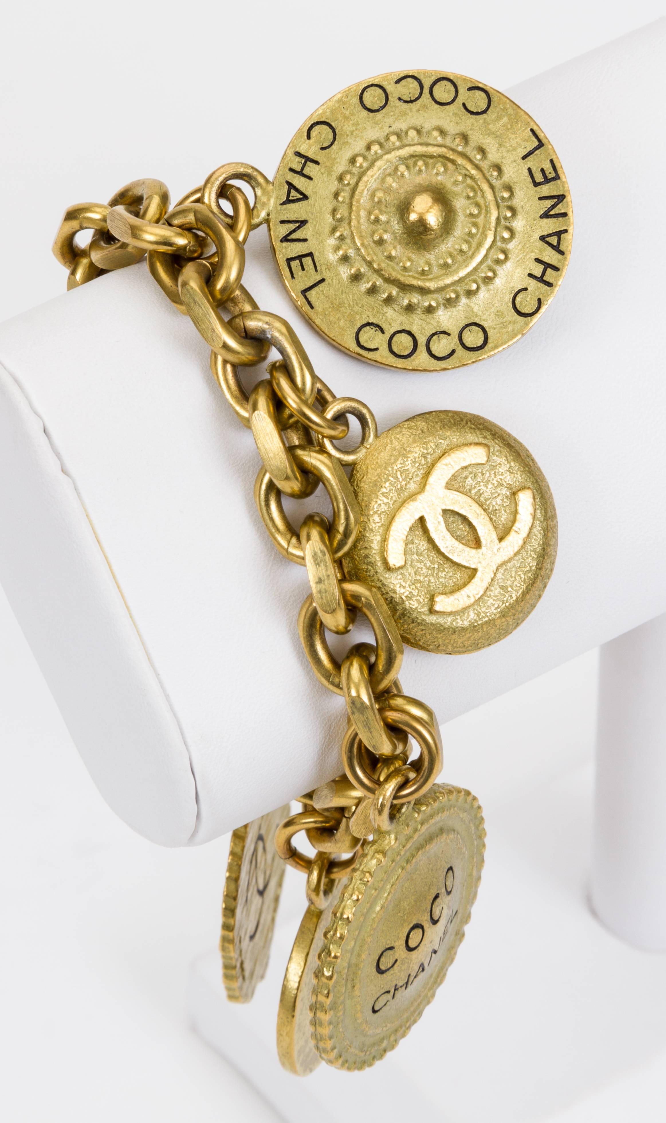 Chanel satin gold log cc coin charm bracelet. Collection spring 95. Come with original box.
