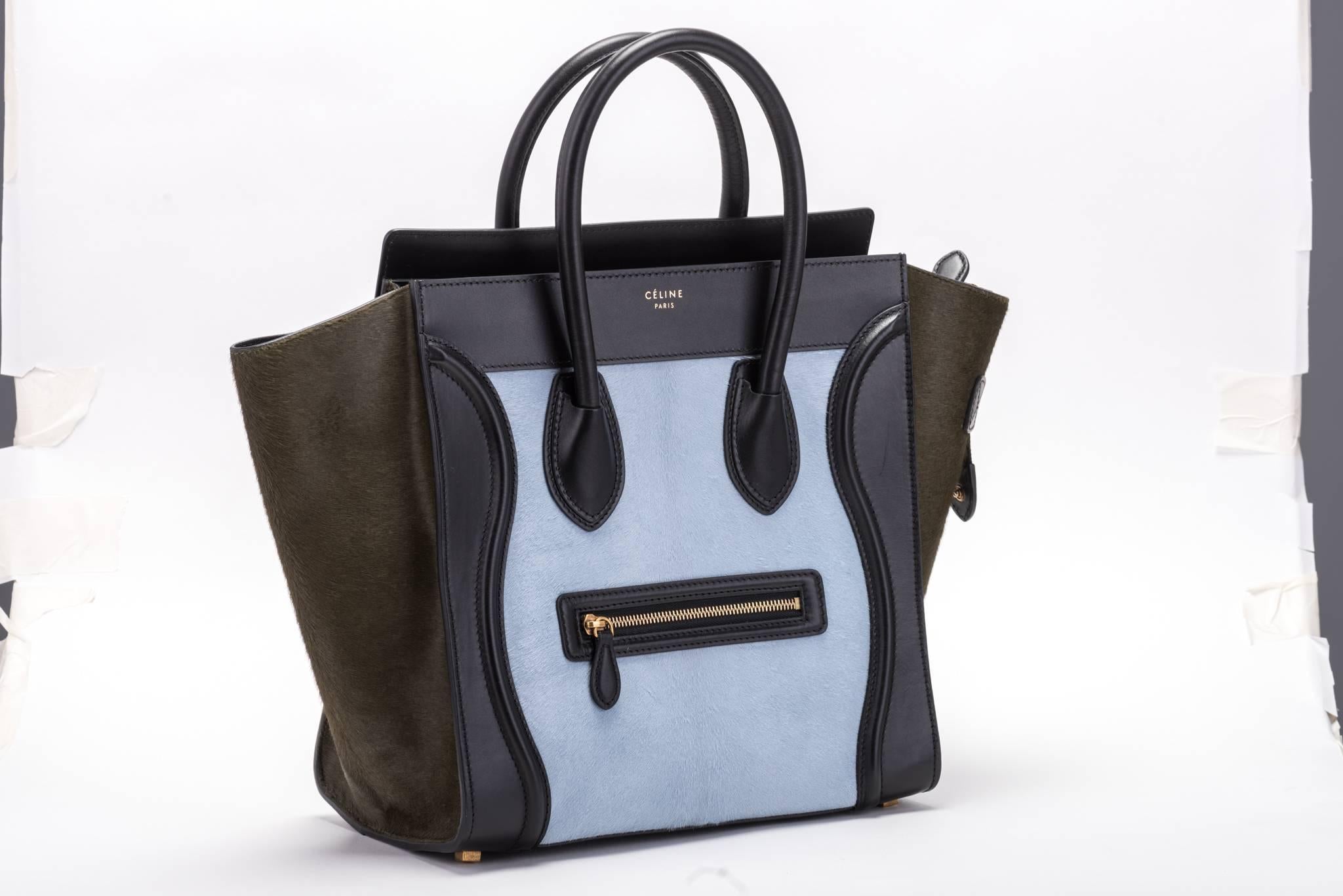 Celine tricolor mini luggage in black calfskin leather and pony hair.  Hand carry with 5