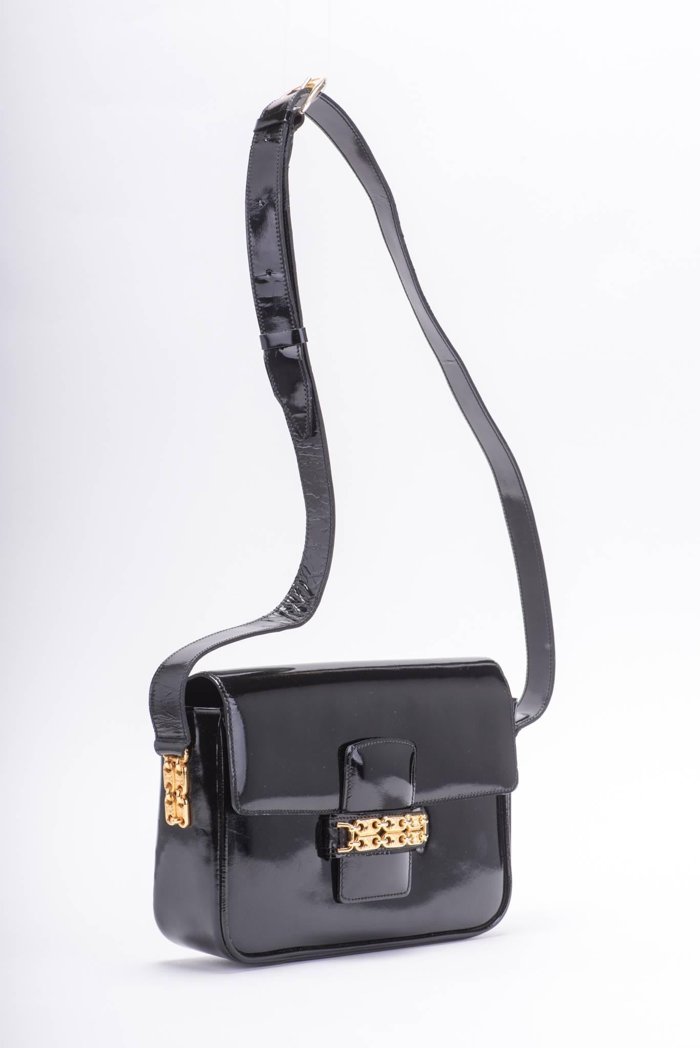Celine vintage black patent leather shoulder bag with gold tone chain details. Very good condition. Shoulder drop 15