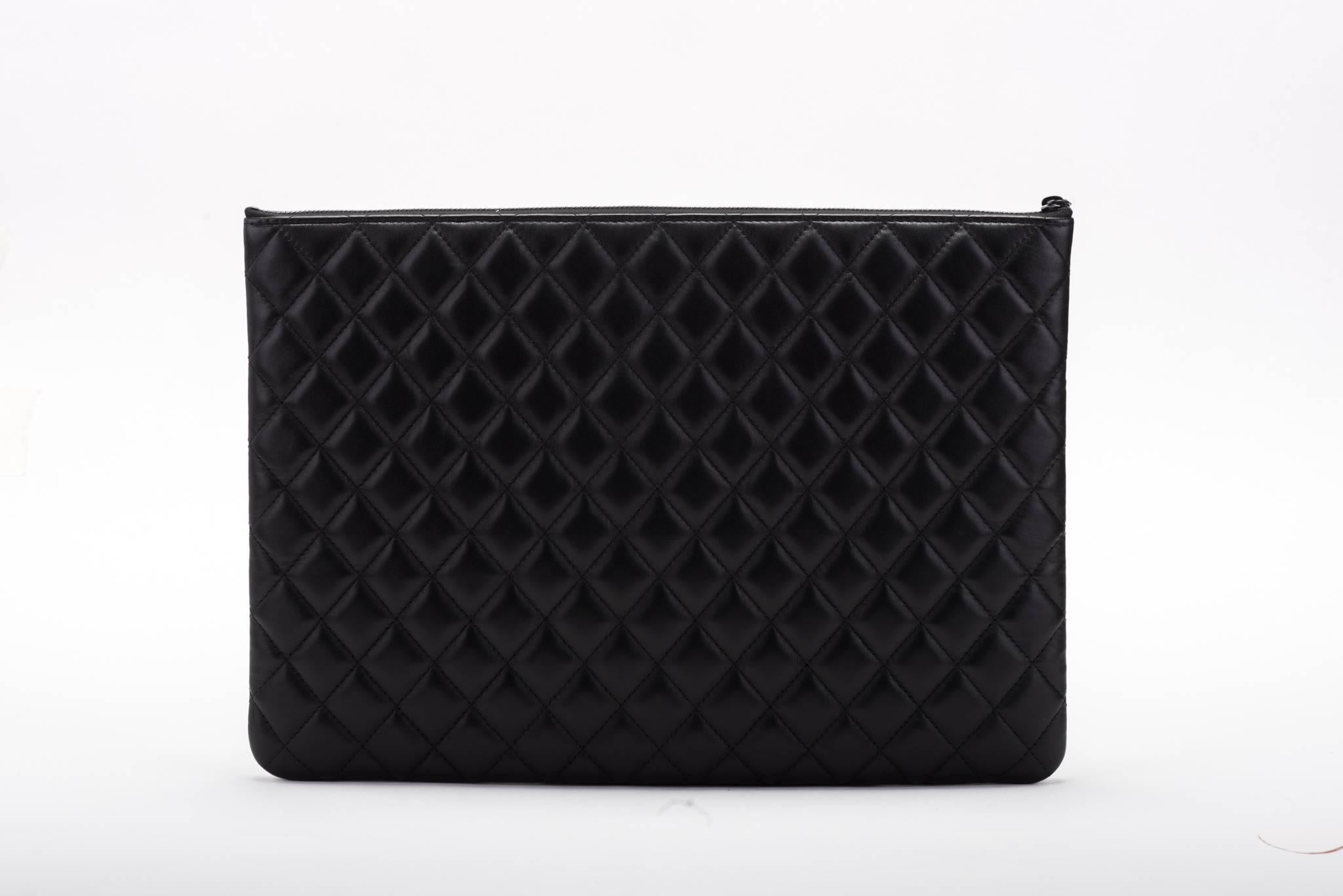 Chanel brand new in box timeless black and white quilted  clutch. Signature CC center logo . Comes with hologram, ID card, booklet, box and ribbon.