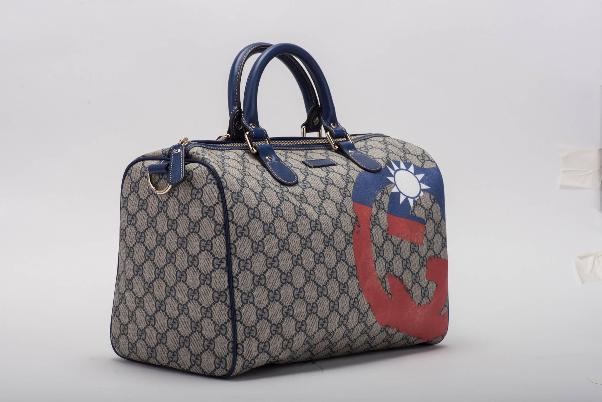 Gucci limited edition guccissima logo canvas coated boston bag.Beige canvas with blue leather trims and palladium hardware. Handle drop 4.5