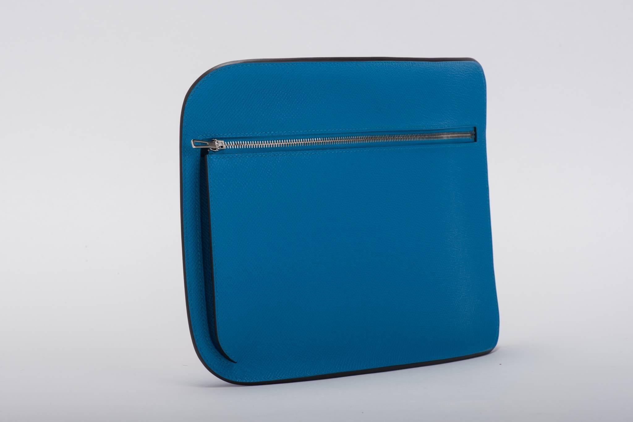 Brand new in Box: Hermes blue Zanzibar epsom leather new clutch with palladium zipper. Great new tridimensional shape, this clutch is a novelty for the 2017 collection. Comes with dust cover, box, ribbon and shopping bag.