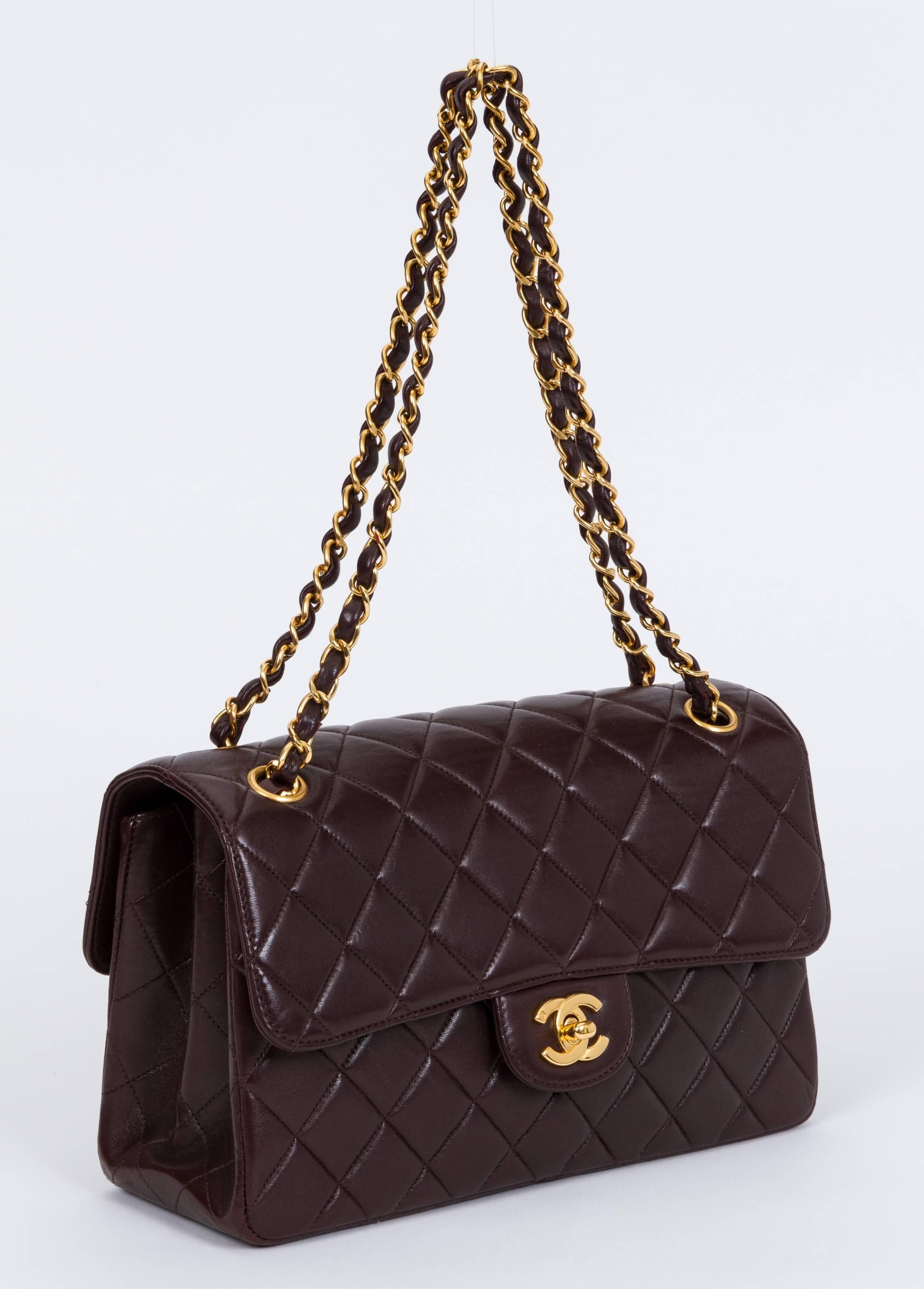 1990's Chanel collectible double sided brown quilted lambskin medium flap. Gold tone hardware. Shoulder drop 9
