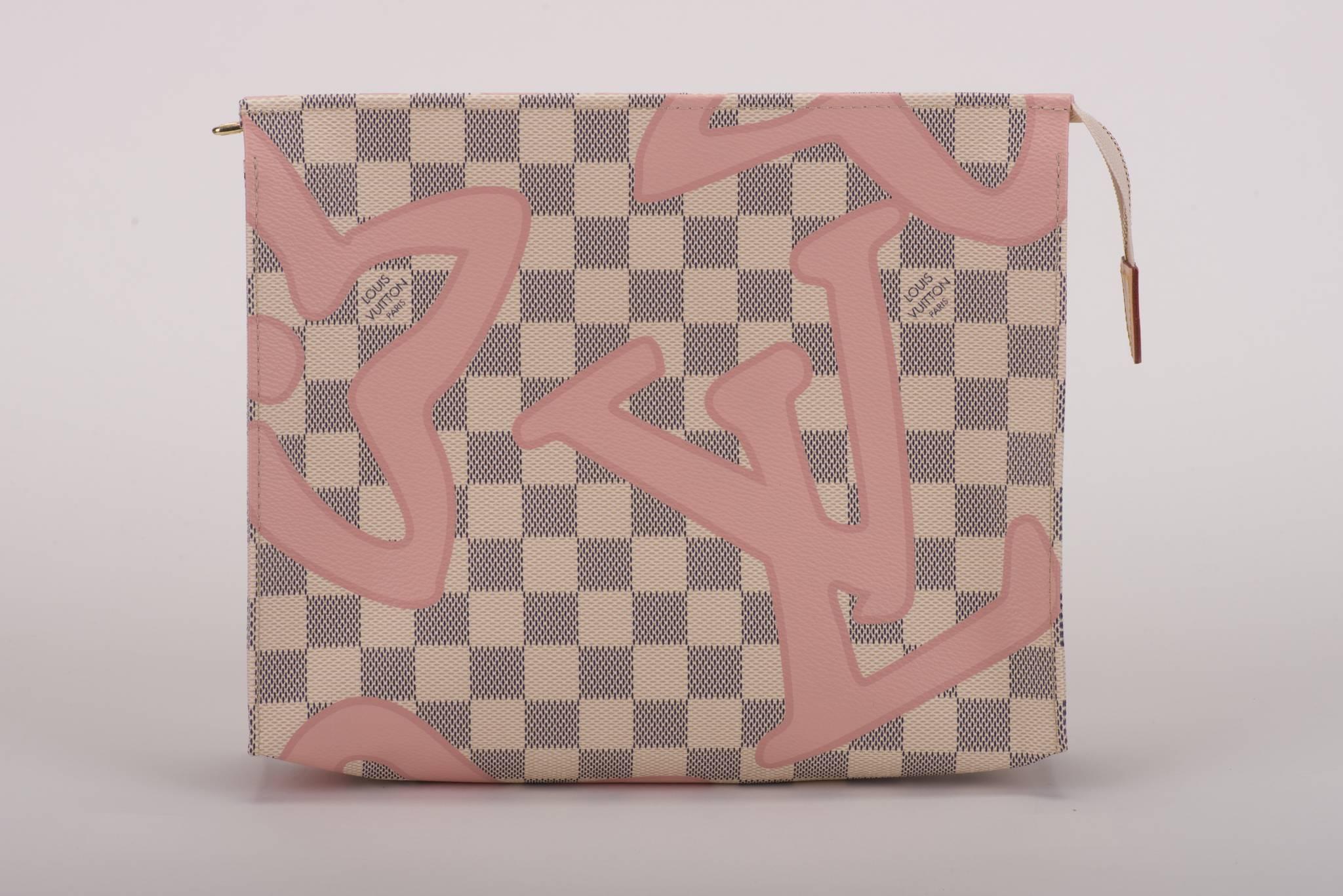 Louis Vuitton limited edition white admire couchette with pink decor. Brand new, comes with duster and box.