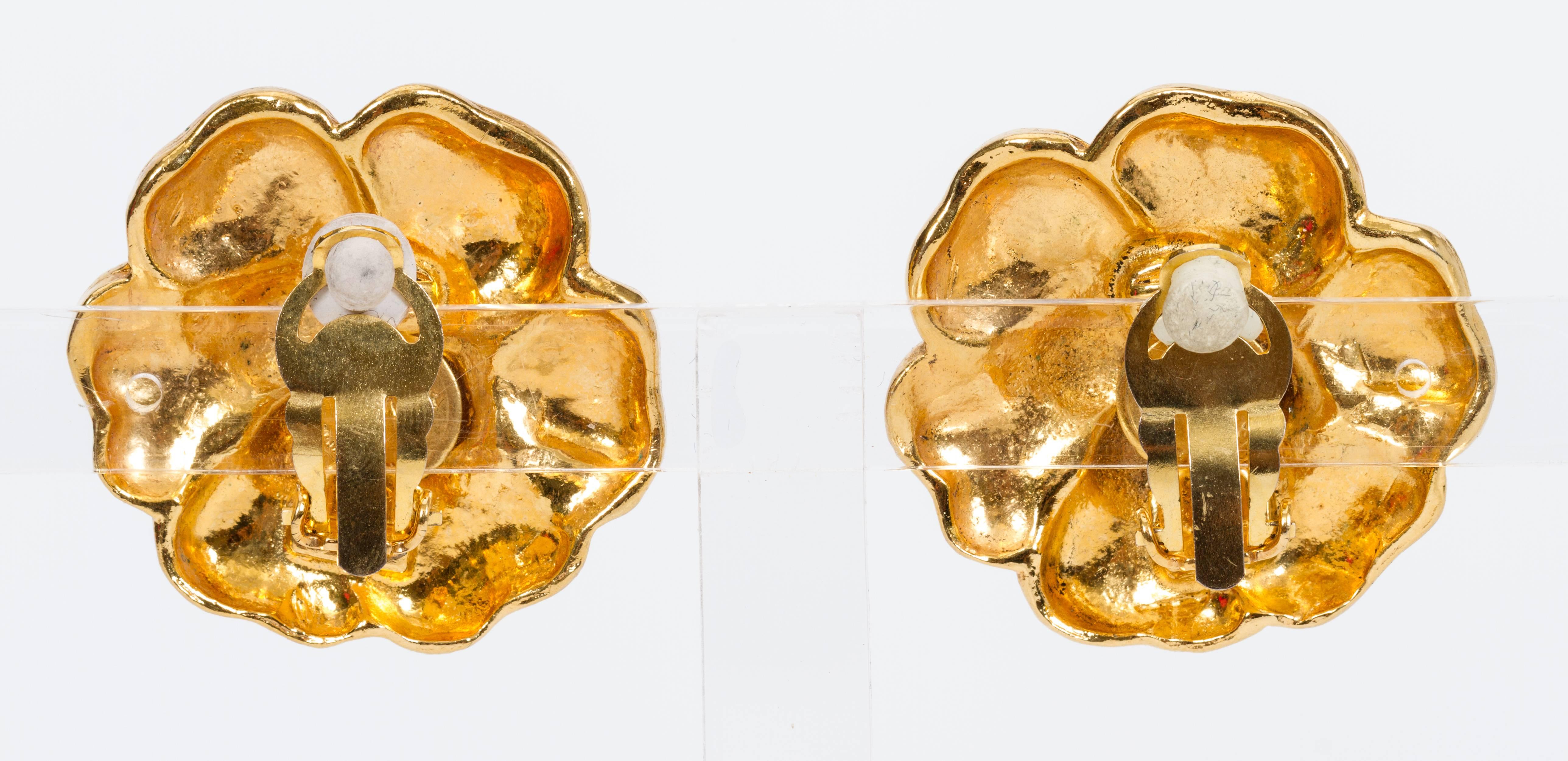 Chanel 70s iconic camellia gold clip earrings. Come with original box.