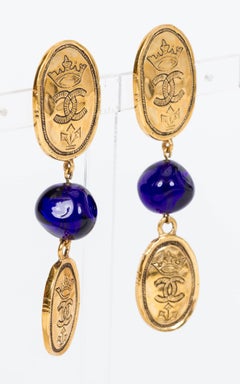 Chanel Blue Gripoix Logo Coin Earrings