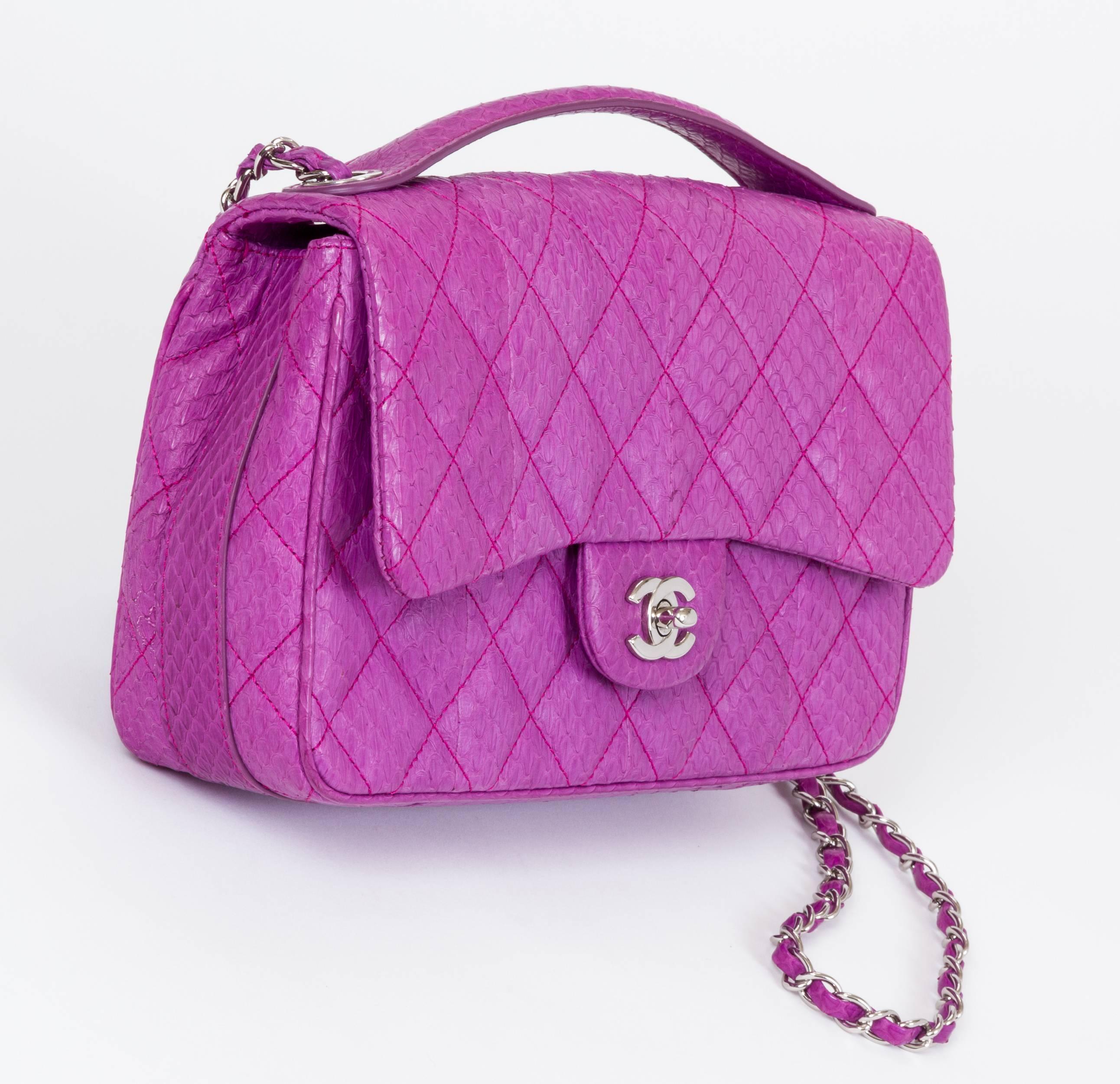 Chanel rare and brand new purple python handbag with double strap. Handle drop 1
