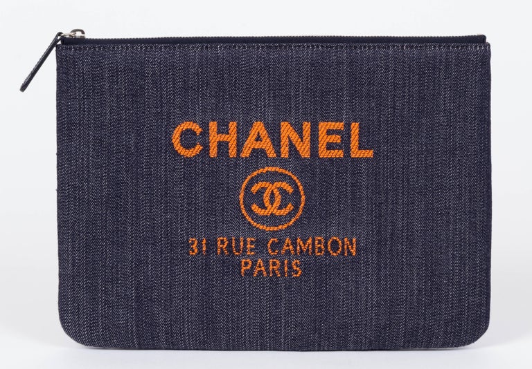 Chanel Medium Denim Zipped Clutch For Sale at 1stdibs