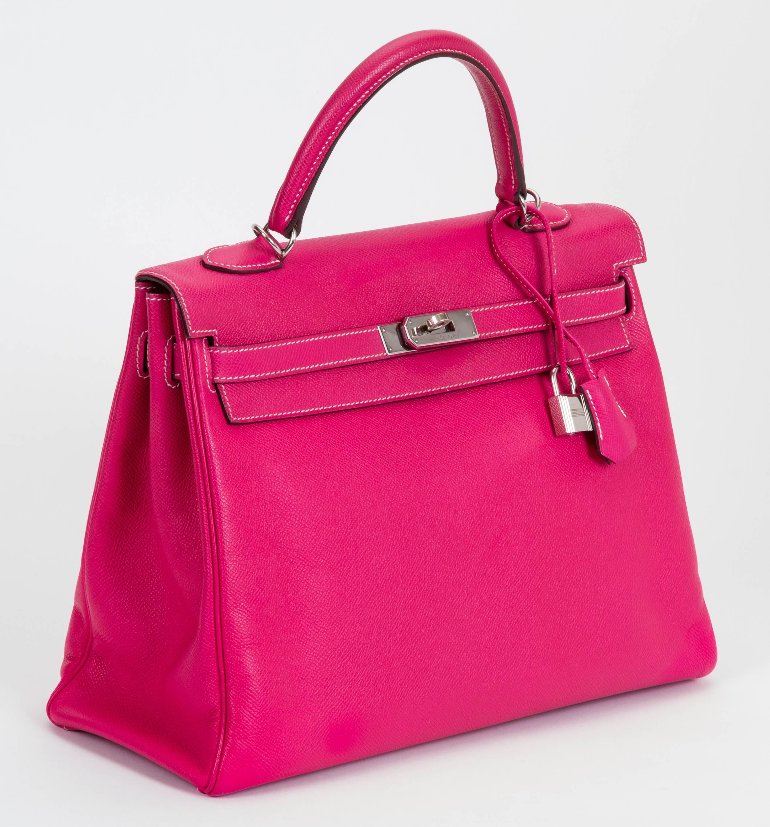 Hermès limited edition candy Kelly 35 cm, retourne bag in rose tyrien epsom leather exterior /tosca chèvre misore interior and palladium hardware. Handle drop, 3.5