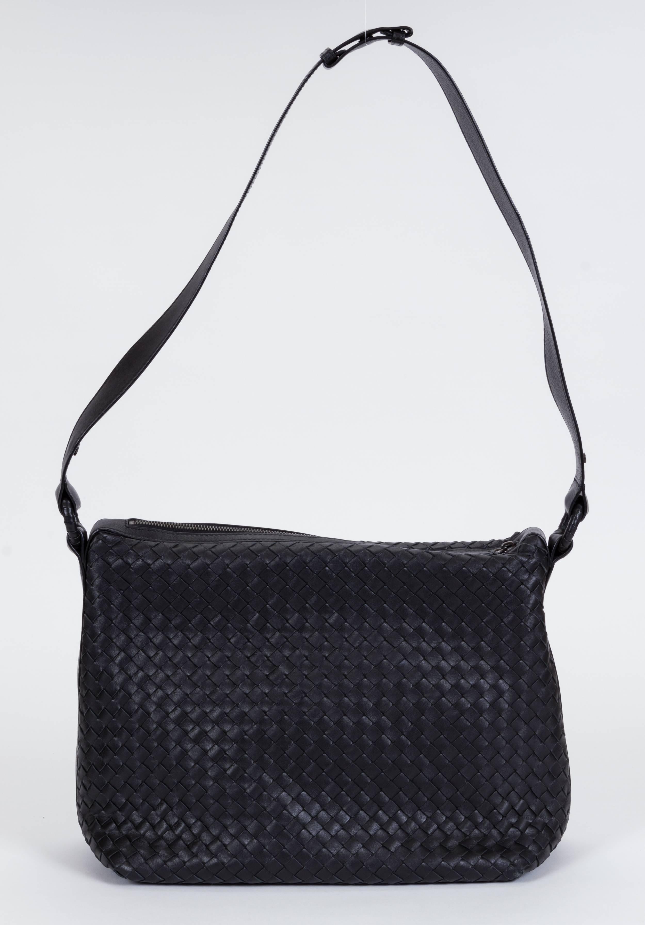 black woven handbag