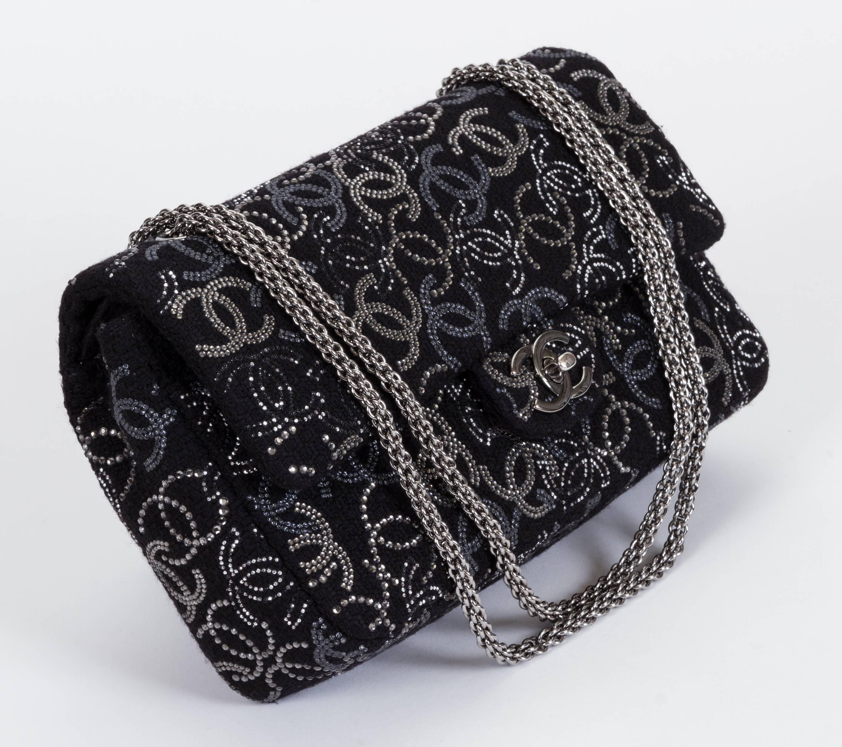 Chanel brand new black tweed and silver rhinestones cc logo evening double flap. Never carried. Shoulder strap 9