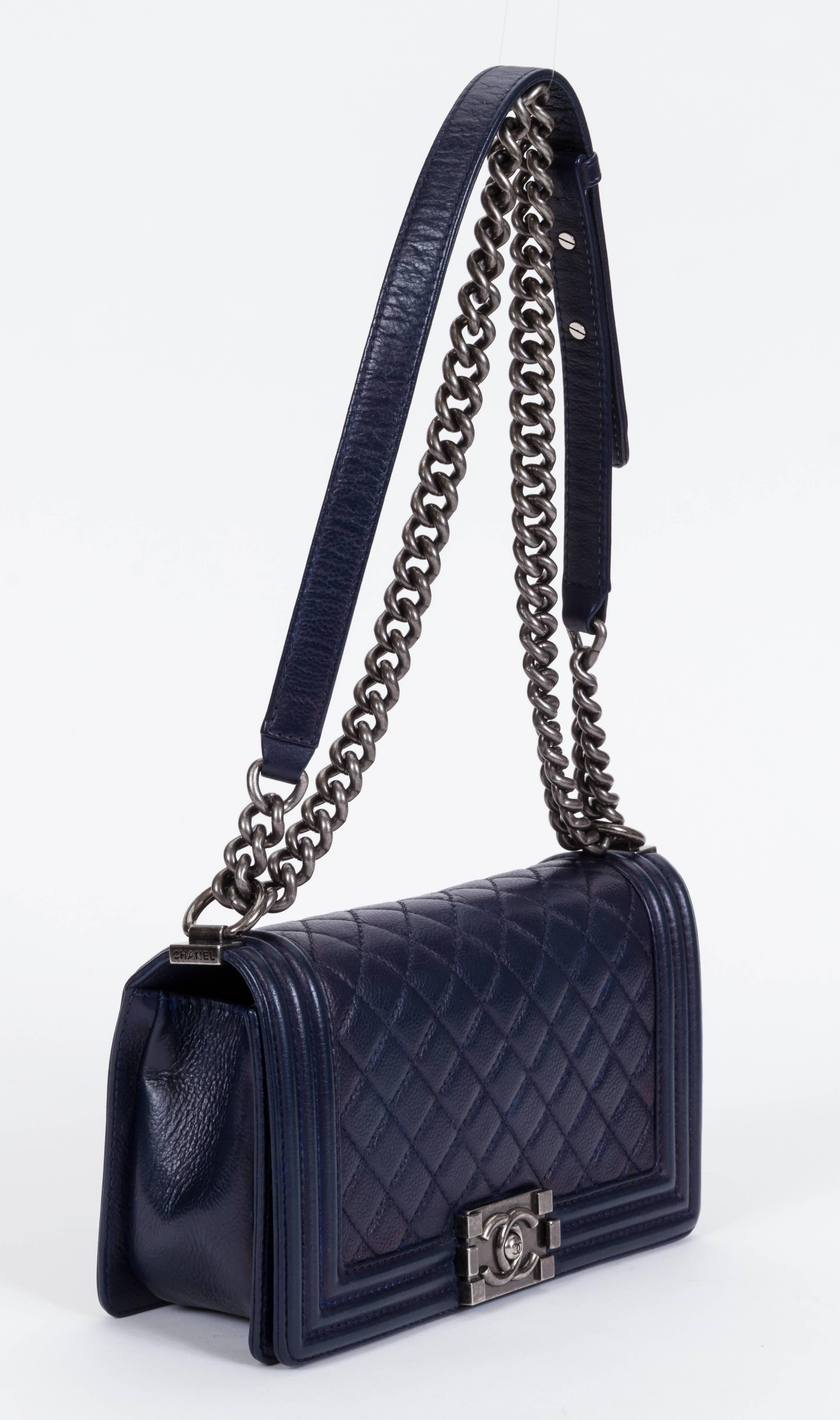 Chanel navy caviar quilted medium boy bag. Gunmetal hardware. Shoulder drop 12
