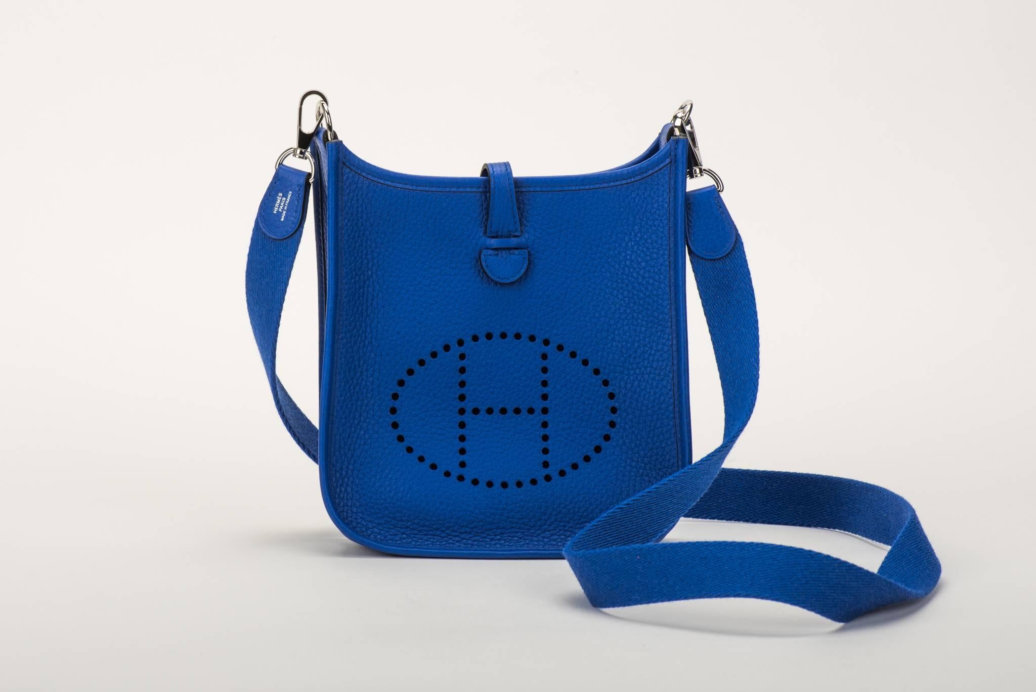 Hermès mini Evelyne shoulder bag in electric blue clemence leather with palladium hardware. Never used. Dated 