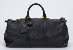 1990's Collectible Chanel Oversized Black Lambskin Keepall Travel Bag