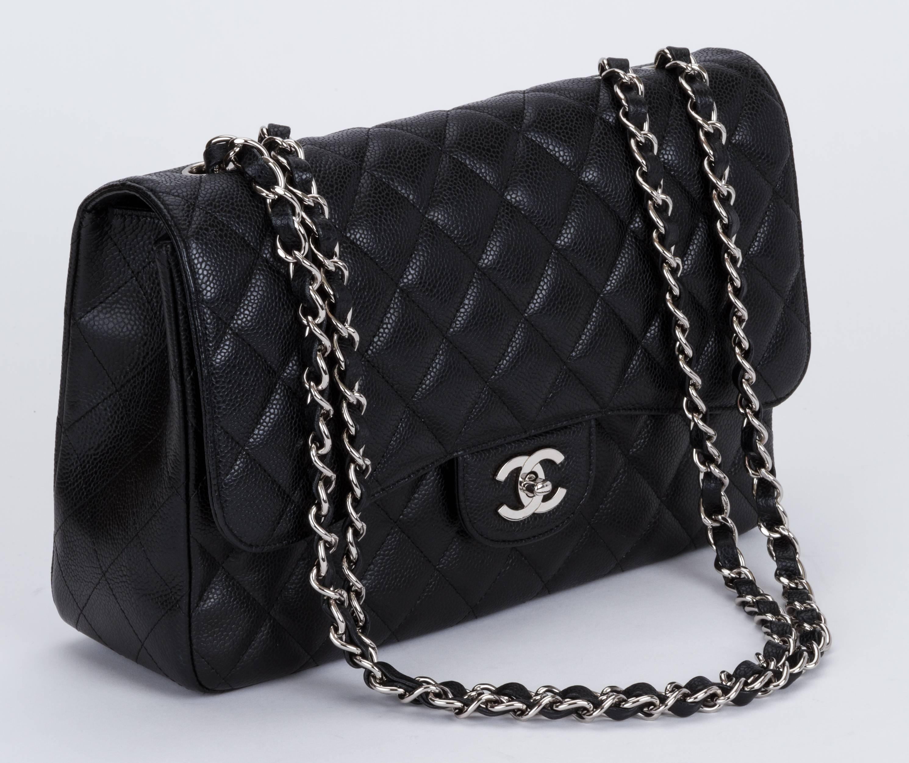 Chanel black caviar quilted single flap jumbo classic bag. Excellent condition. Shoulder drop 14