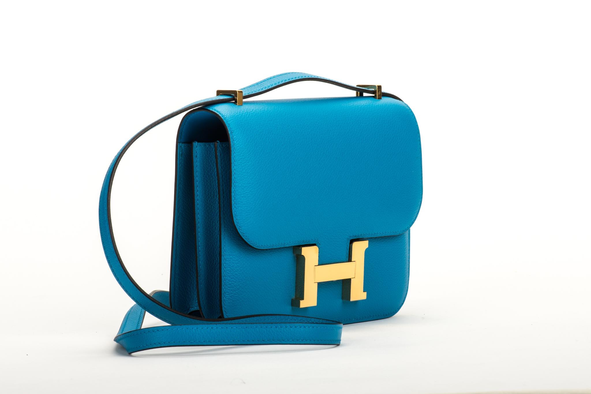 Hermès evercolor blue zanzibar mini constance cross body with gold tone hardware. Date stamp A for 2017. Brand new in box. Handle drop 11