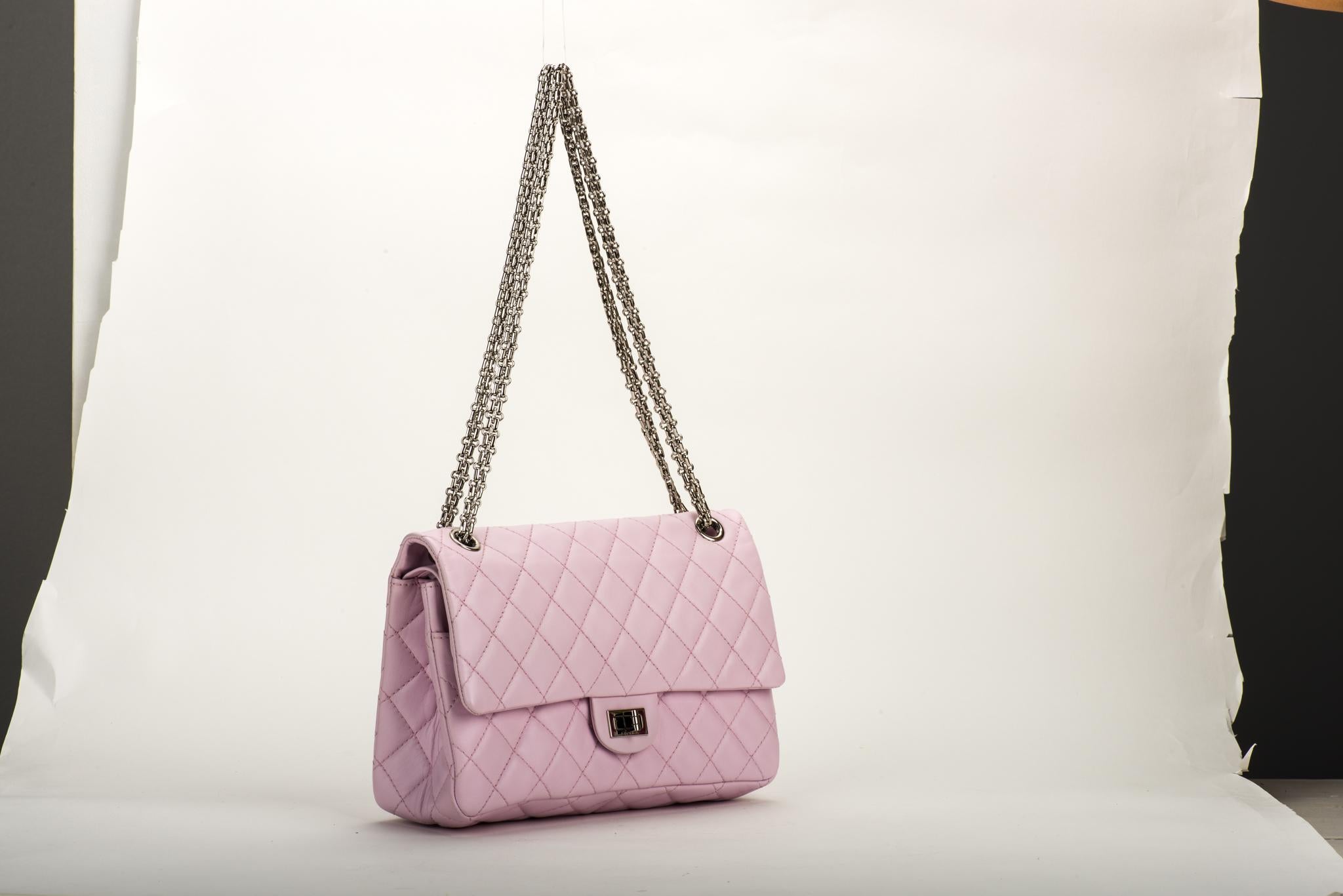 Chanel rare light pink lambskin medium reissue double flap. Excellent condition. Silver hardware. Shoulder drop 10