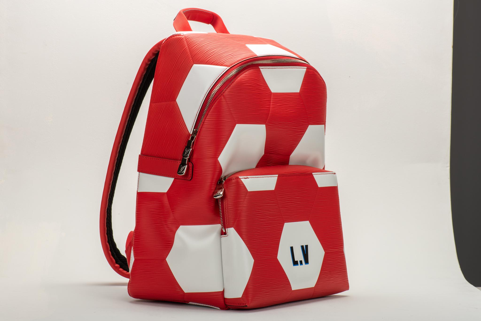 Louis Vuitton SOLD OUT WORLDWIDE FIFA Russia 2018 red and white soccer Apollo backpack. Brand new in box, never worn, comes with hologram identification card. Comes with hologram, dust cover and original box.
