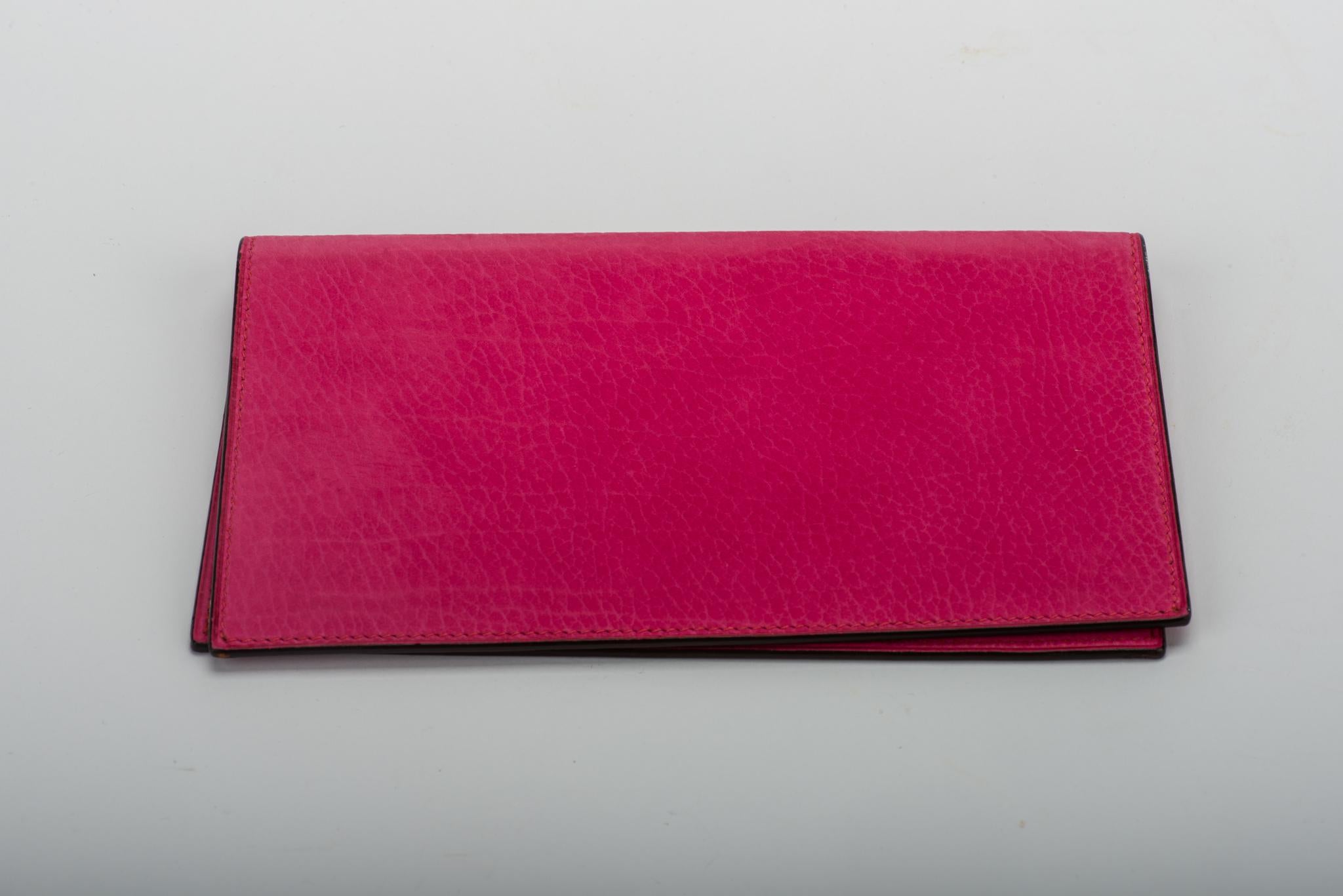 Hermès hot pink suede checkbook cover. Never used in original box, date stamp I for 2005. Minor fading throughout the outside. Stamped S for sale.