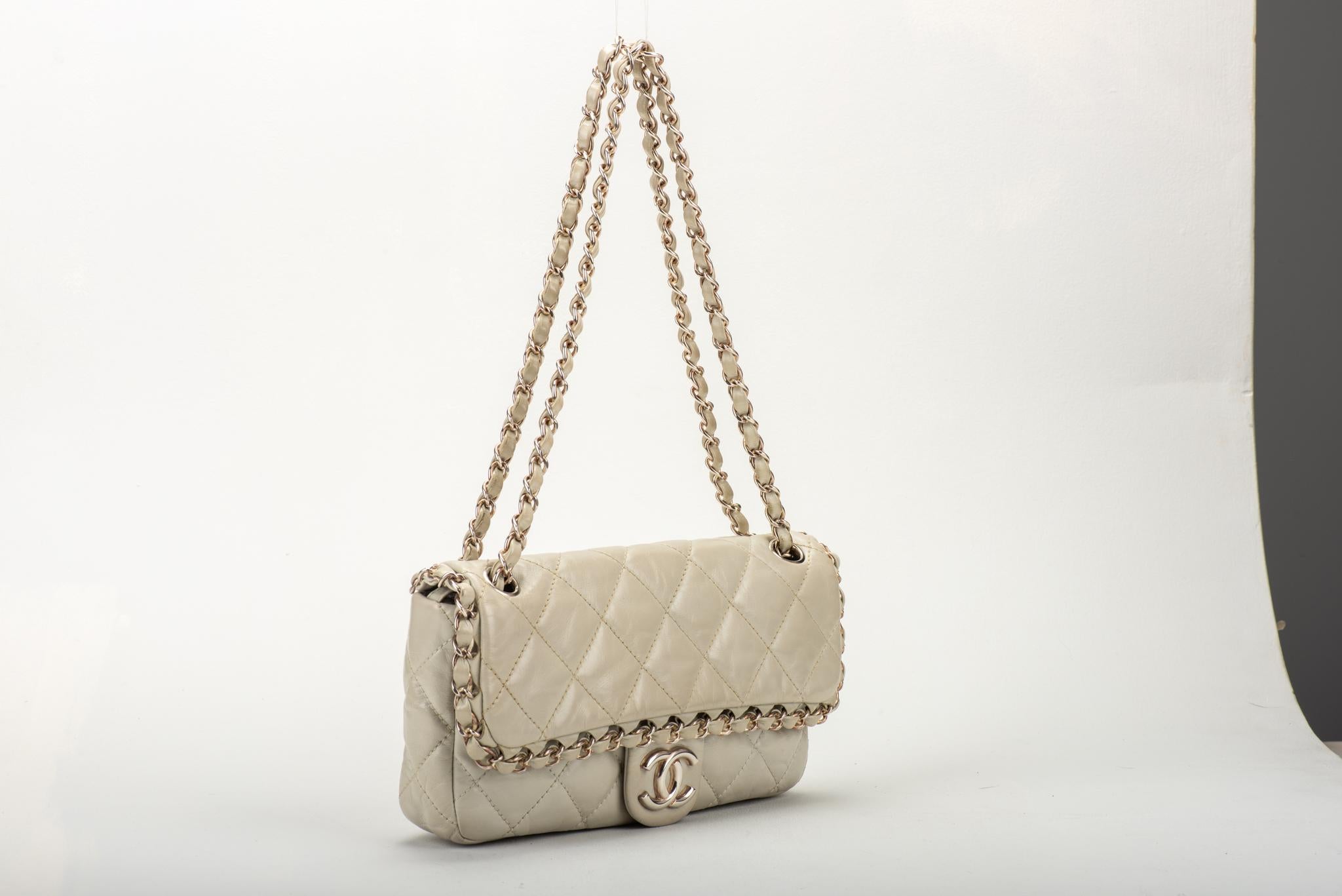  Chanel ice white distressed shiny leather silver chain detail evening bag. Very good condition.  Shoulder drop 9.5