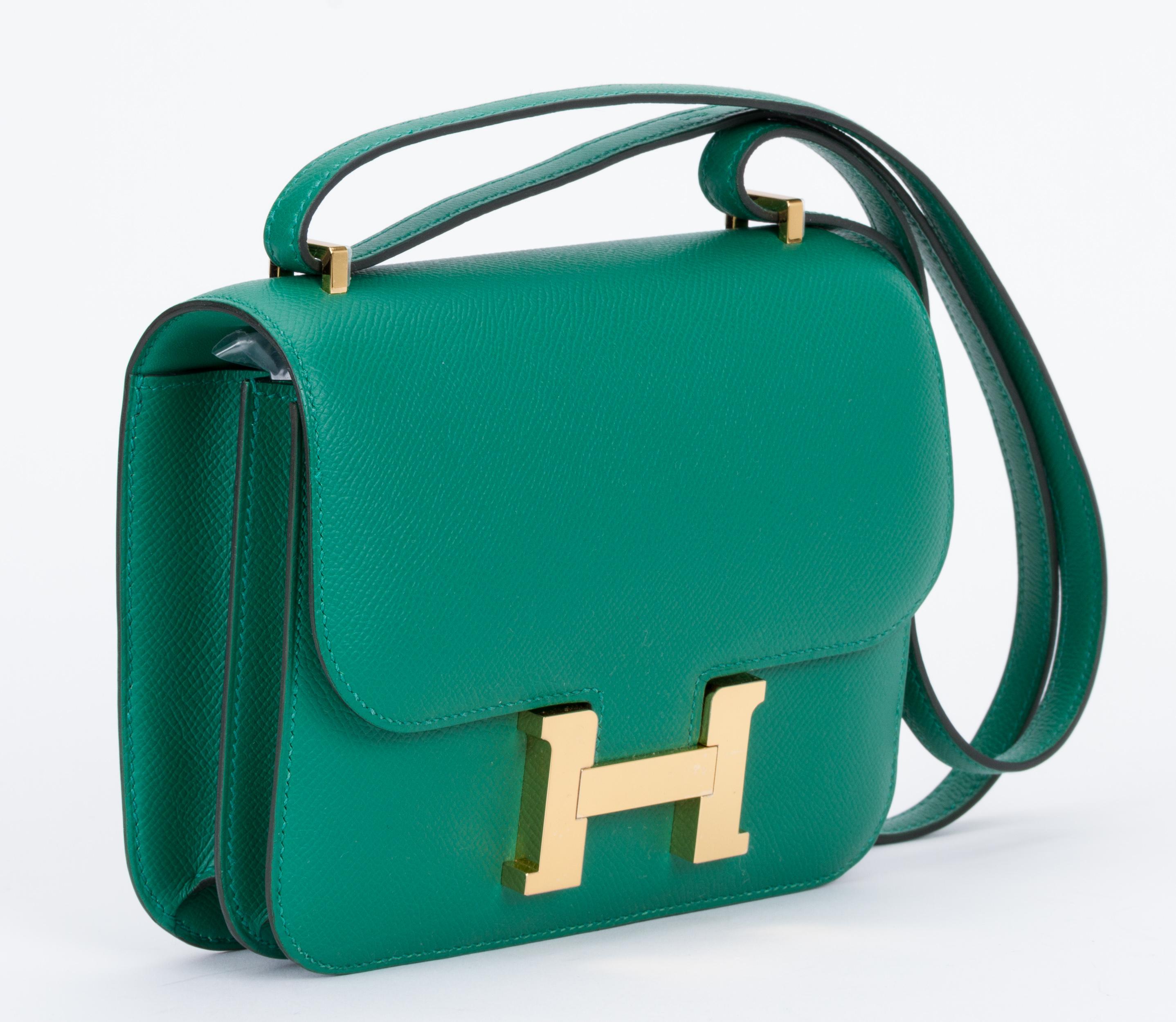 Hermes rare mini constance cross body 18cm in vert vertigo leather and gold tone hardware. Shoulder drop 11