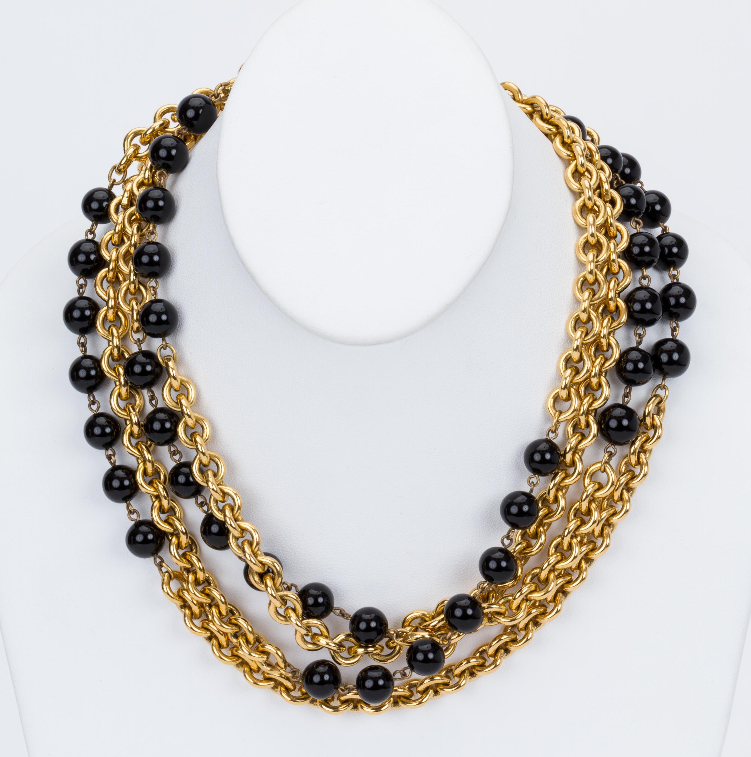 Chanel timeless black and gold double long necklace. Can be worn single or double. Collection 1984. Comes with original box.