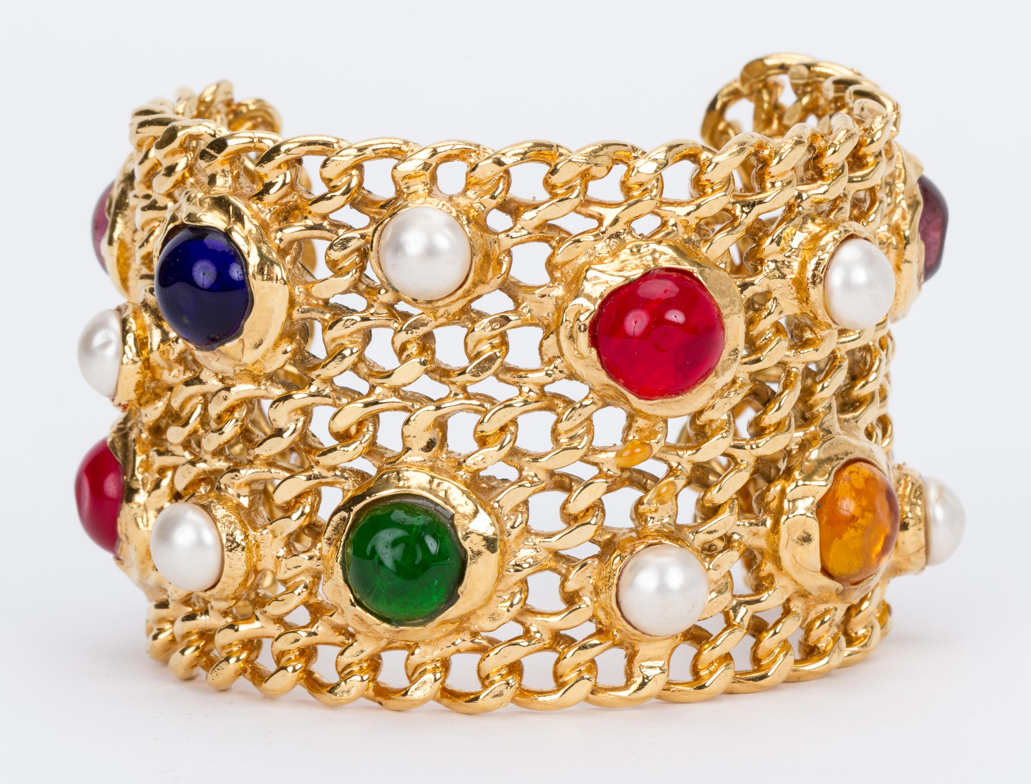 Chanel collectible faux pearl and multicolor gripoix (poured glass) chain cuff bracelet. Interior length 5.5
