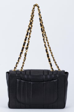 Chanel Black Caviar Vertical Jumbo Flap
