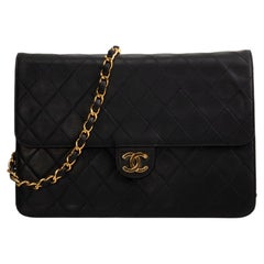 CHANEL Vintage Push Lock Single Flap
