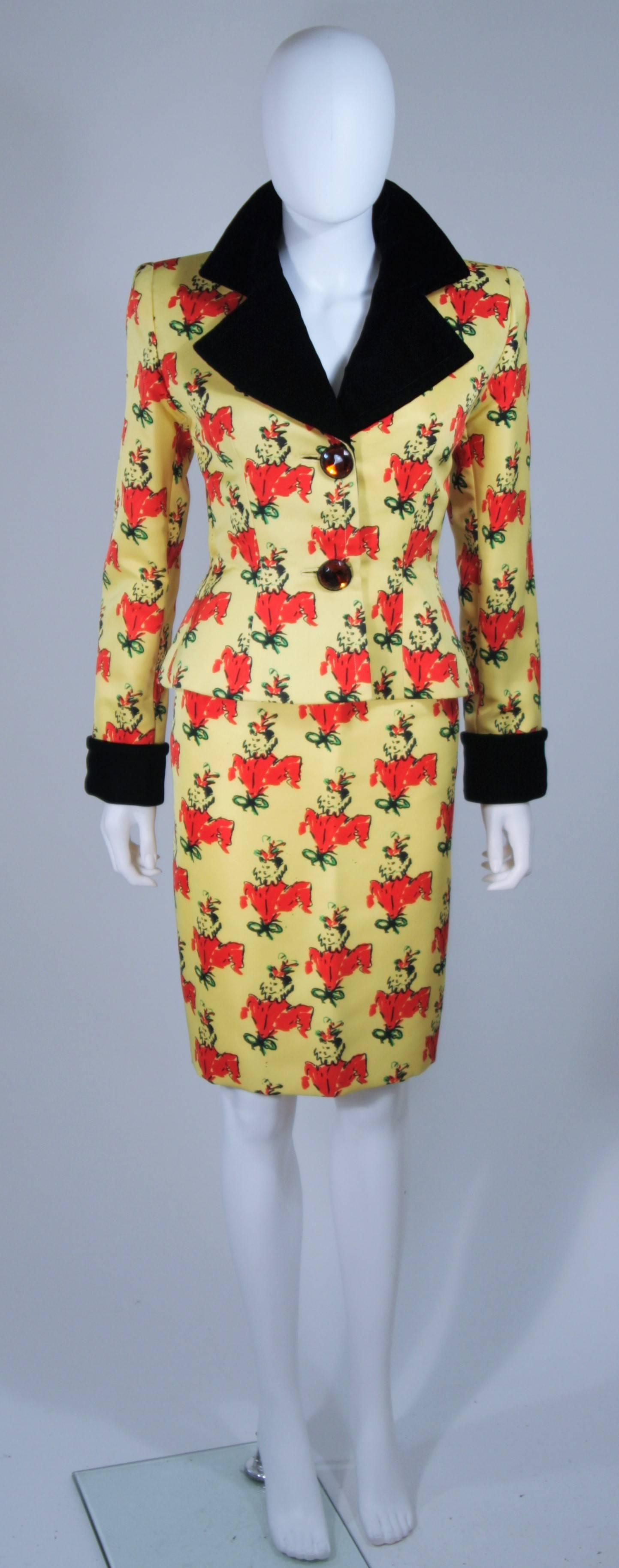 This Givenchy Couture skirt suit is composed of a yellow silk with a portrait pattern print and velvet trim. The jacket has a slight peplum style and large citrine hue rhinestone button closures, at the center front. The pencil style skirt has a