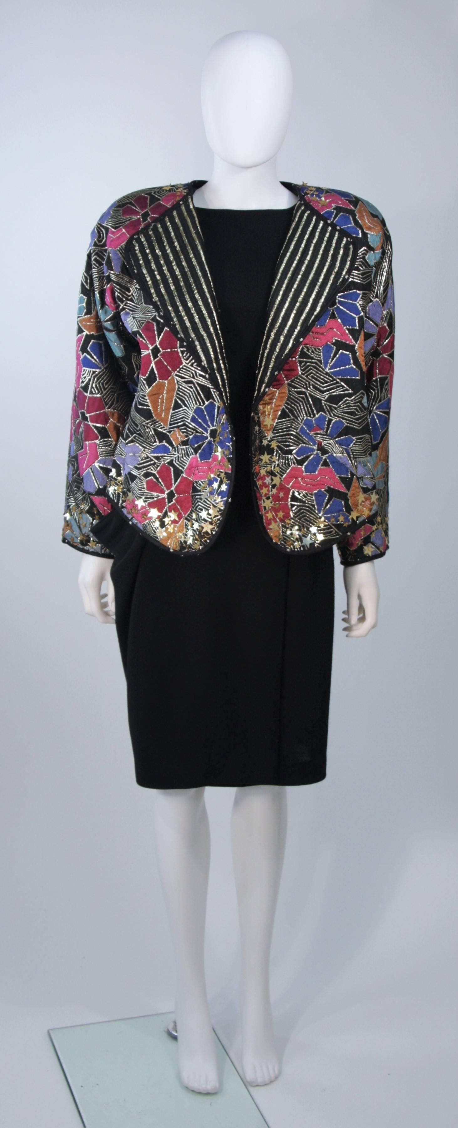  This Geoffrey Beene Couture set is composed of a wonderful draped wool dress with an open back, and a reversible jacket which is adorned with stars. The reversible jacket has attached shoulder pads (which can be removed upon the buyers discretion)