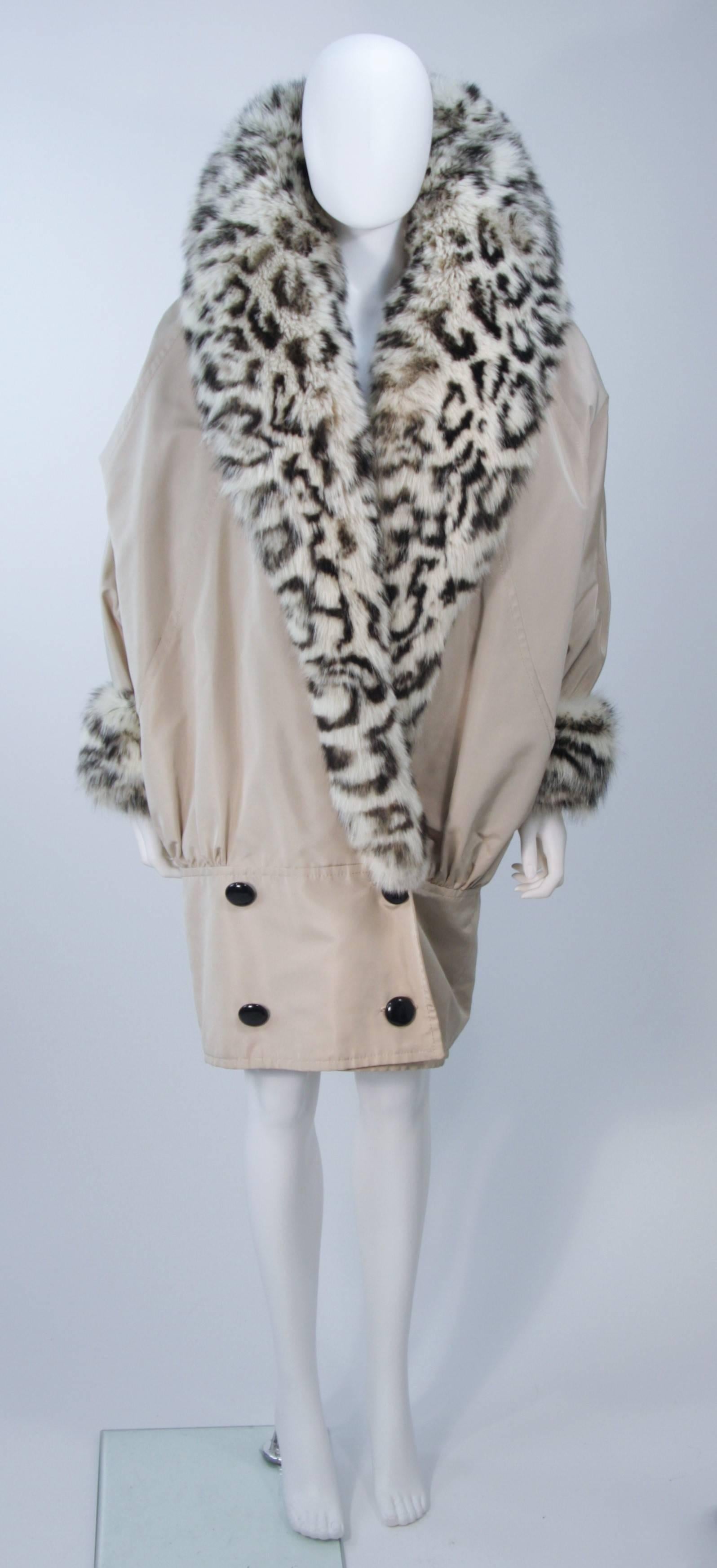 This Andrea Odicini coat is composed of a khaki nylon and features a patterned fox fur trim. There are button closures and side pockets. In excellent vintage condition. 

**Please cross-reference measurements for personal accuracy. 

Measures