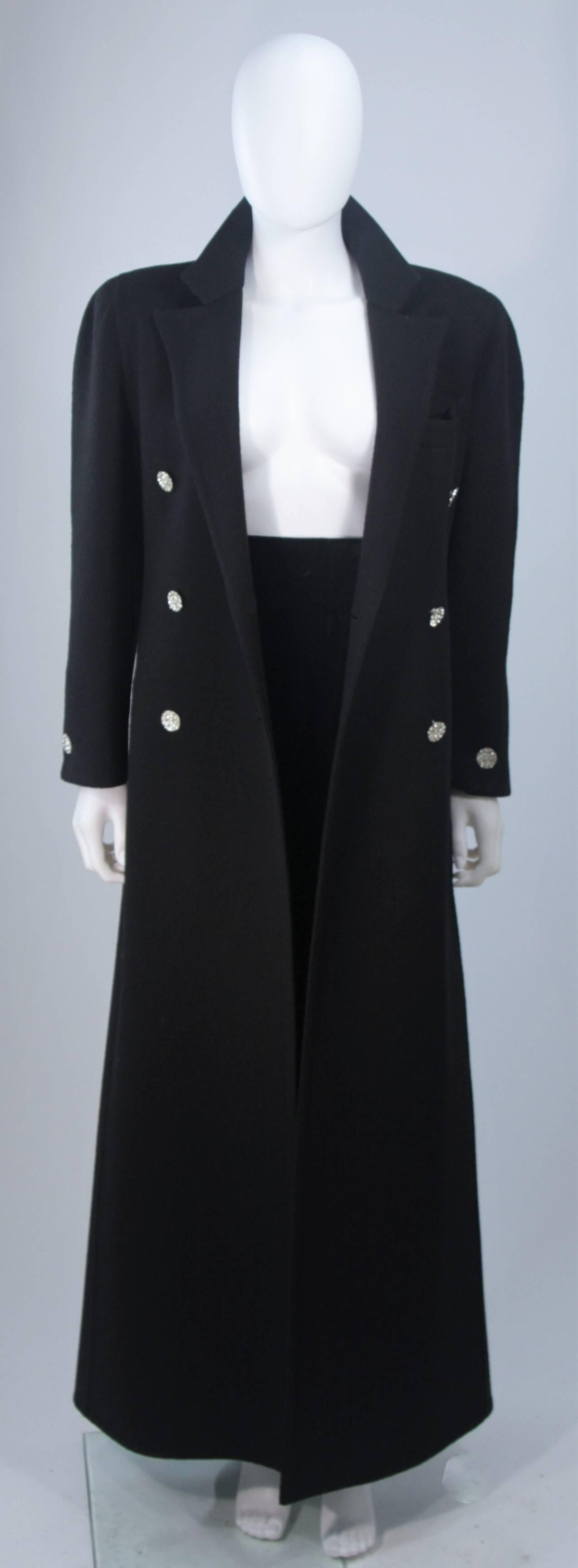  This Bill Blass ensemble is features a full length wool coat with rhinestone buttons and silk tuxedo style pants with a velvet panel. The pants have a side pockets and a zipper closure with hook and eye. In excellent vintage condition. 

**Please