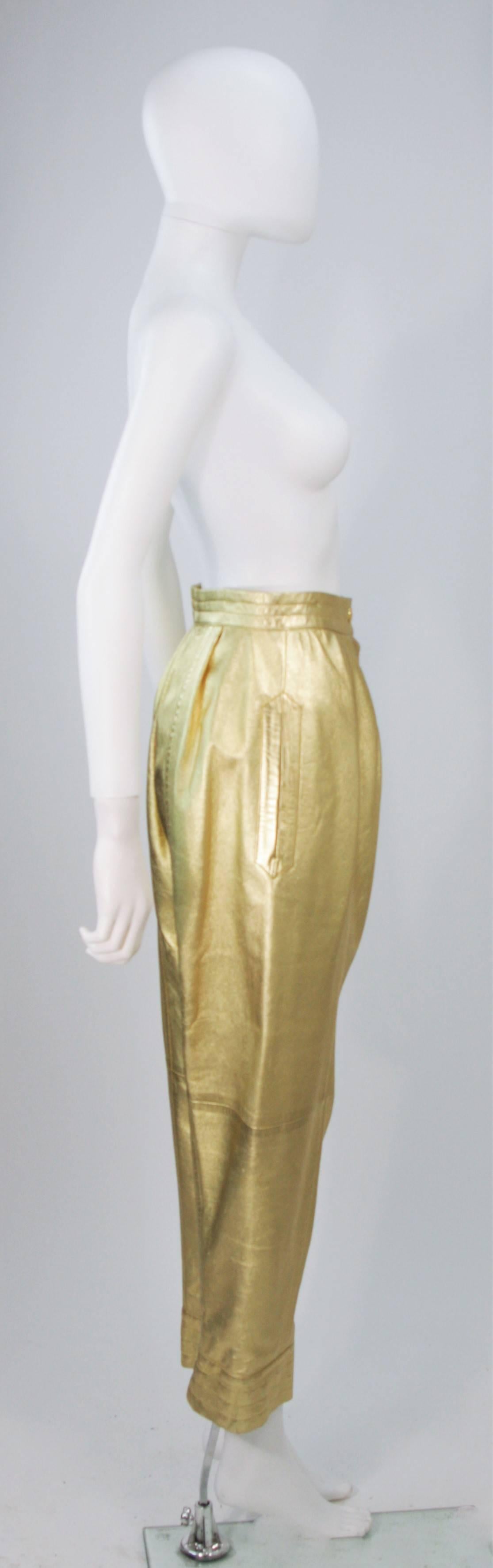 gold pleated trousers