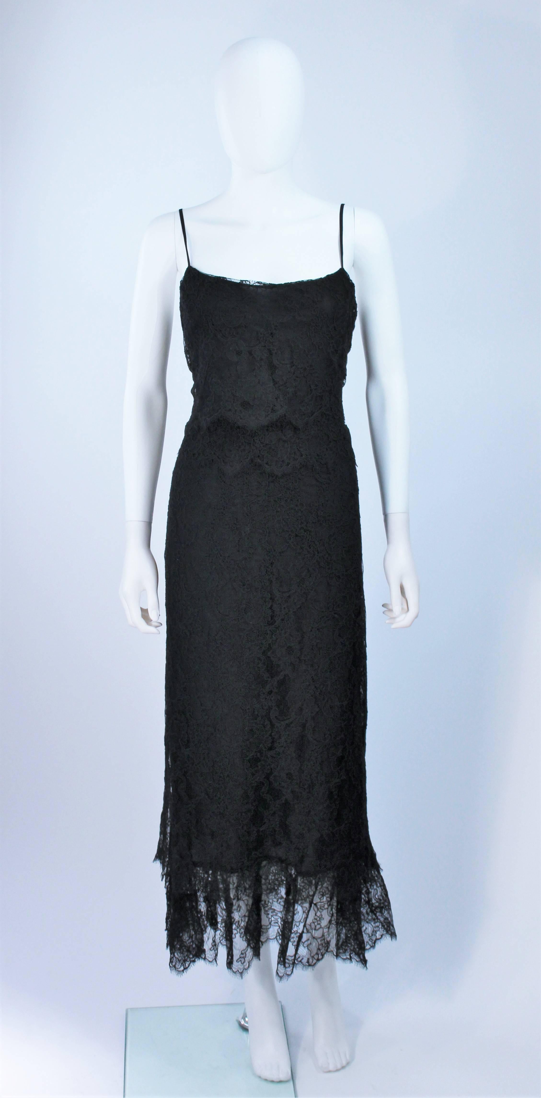  This Chanel dress is composed of an extremely supple black lace and is designed in a tiered fashion with scalloped edges. There is a center back zipper closure. In excellent vintage condition. 

**Please cross-reference measurements for personal