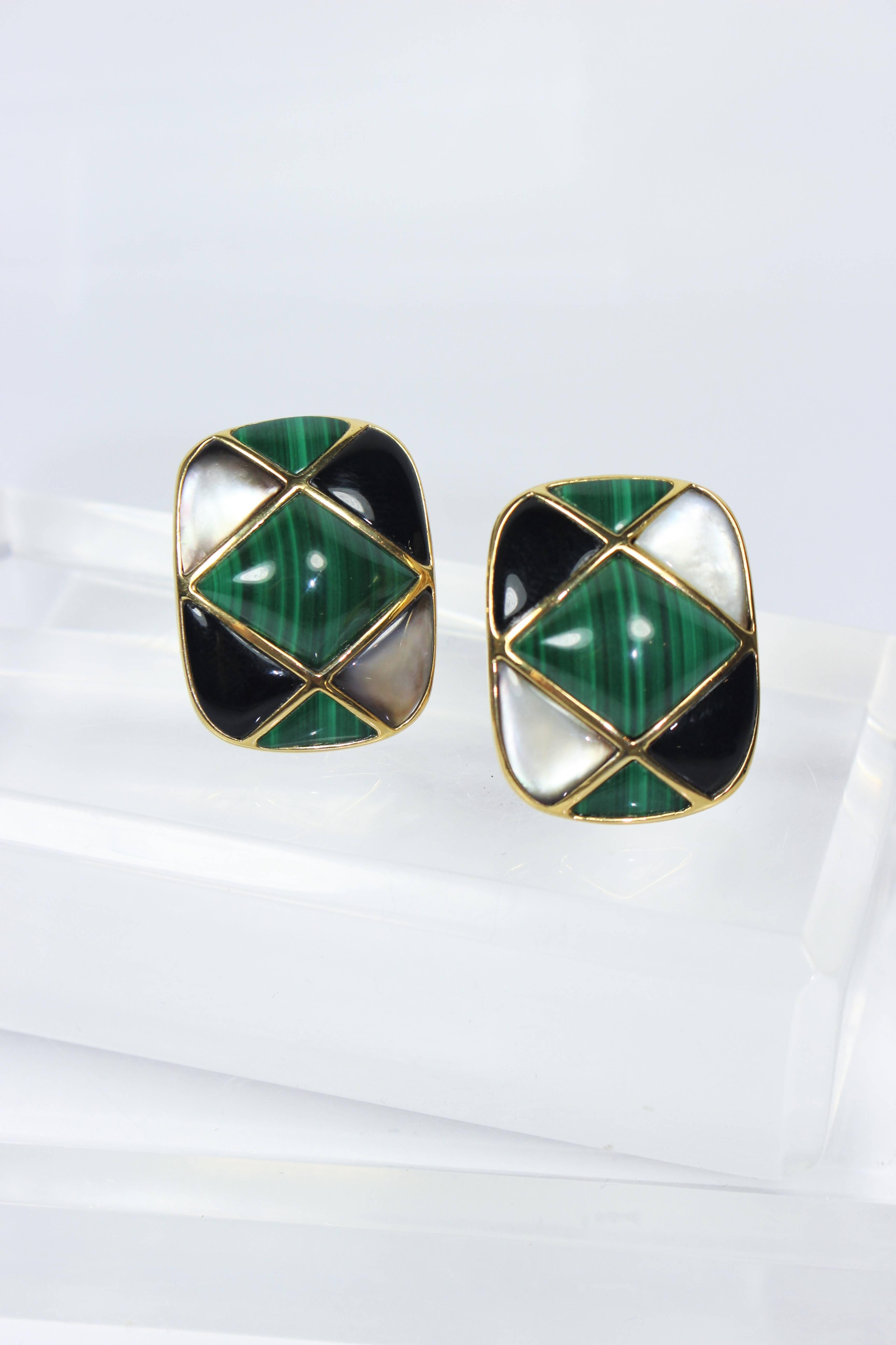 These Kai Yin Lo earrings are composed of a gold plated sterling silver with malachite, onyx, and mother of pearl. They are clip on style. In excellent condition.

**The size in the description box is an estimation; please cross-reference